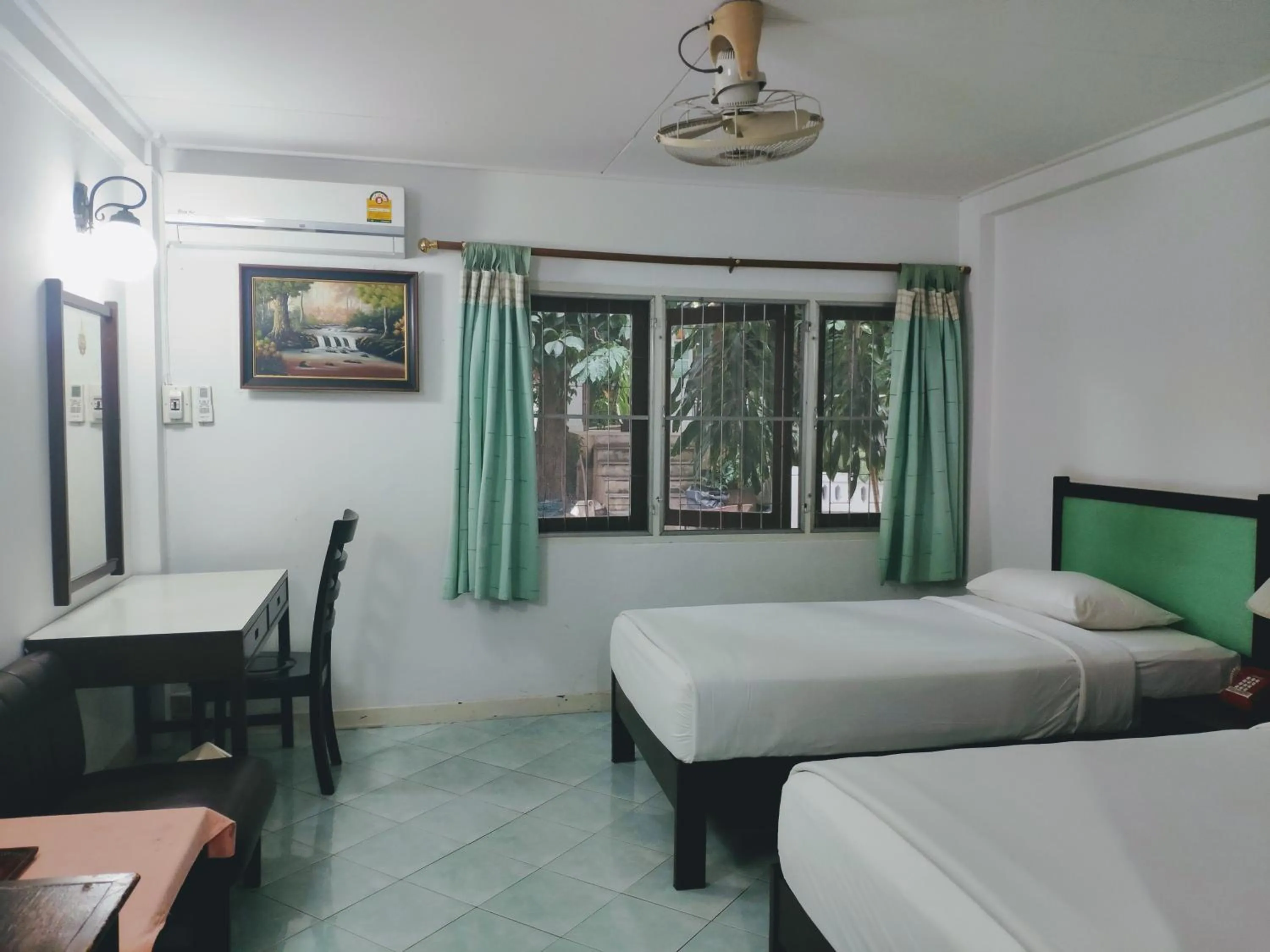 Bed in Changpuak Hotel