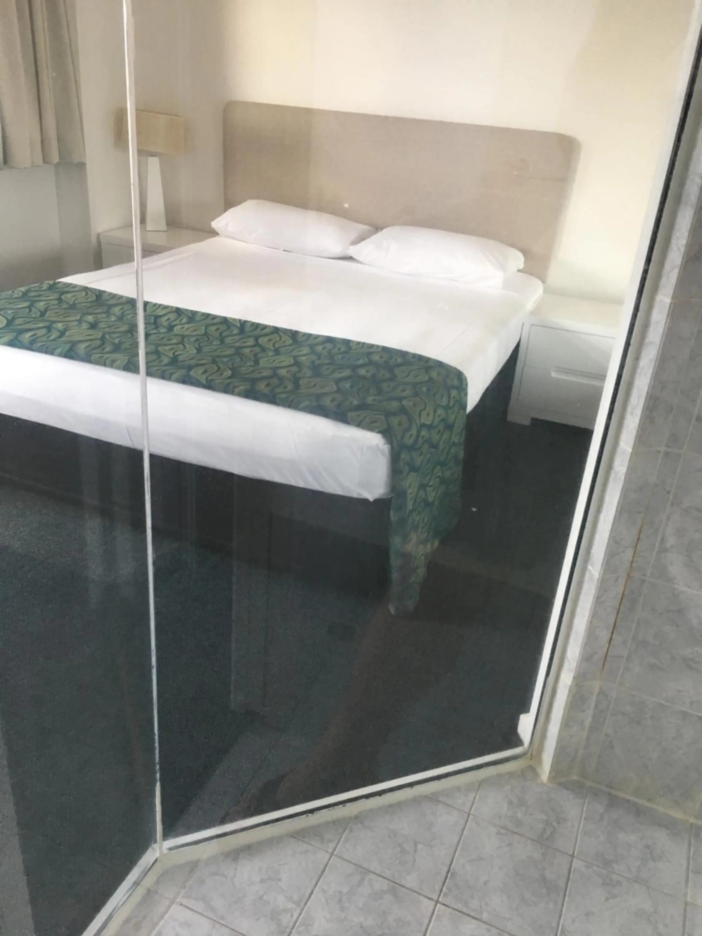 Bed in Portobello Resort Apartments