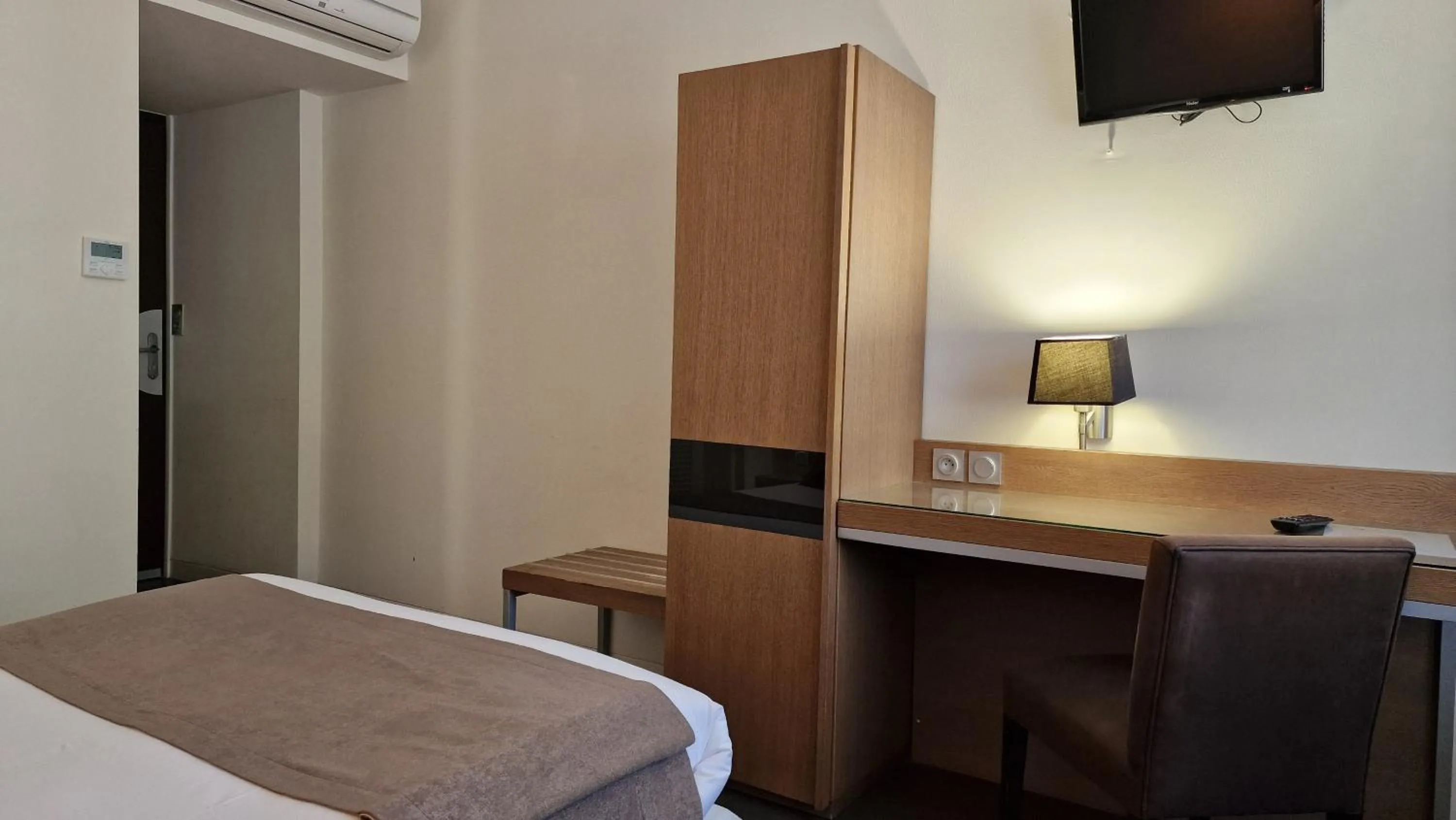 Photo of the whole room, Bed in Hotel Restaurant du Centre et du Lauragais