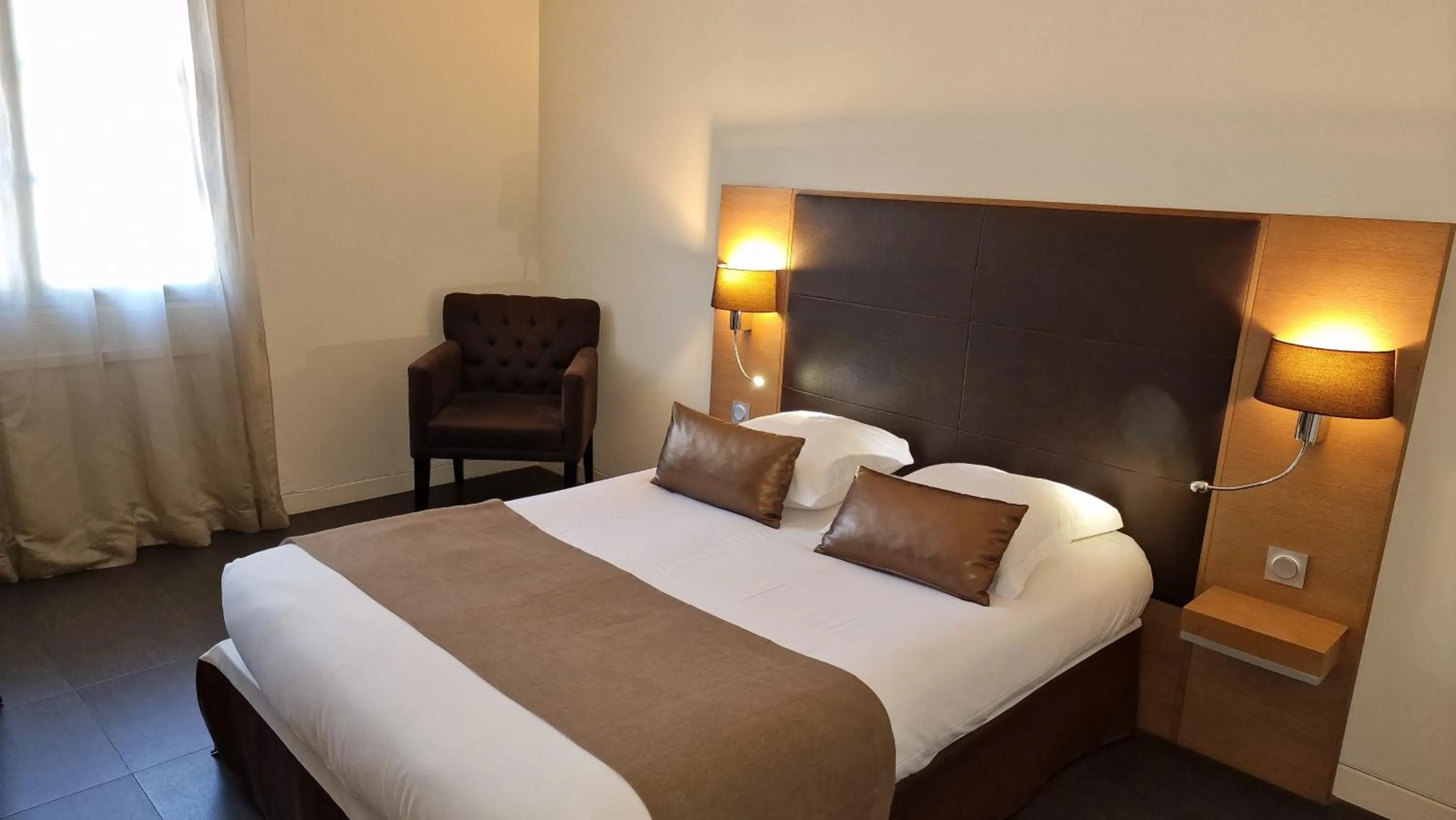 Photo of the whole room, Bed in Hotel Restaurant du Centre et du Lauragais