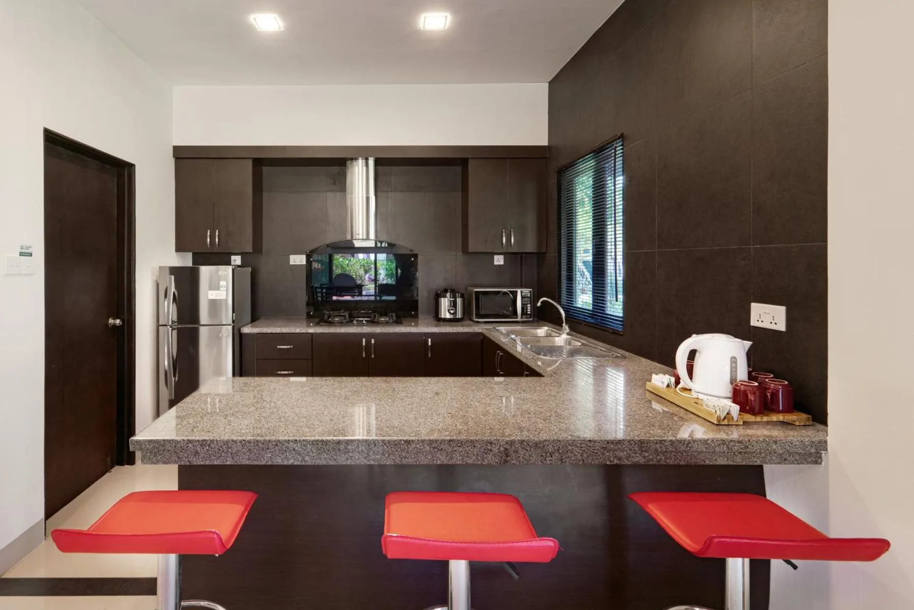 Kitchen or kitchenette in Banyu Biru Villa