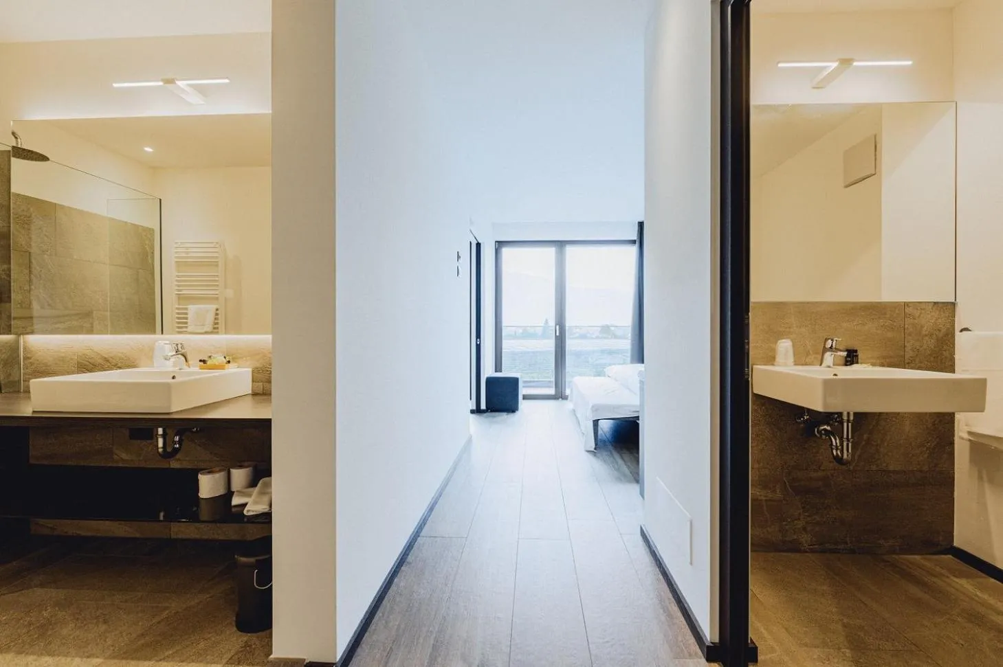 Bathroom, Bed in Hotel Raffl