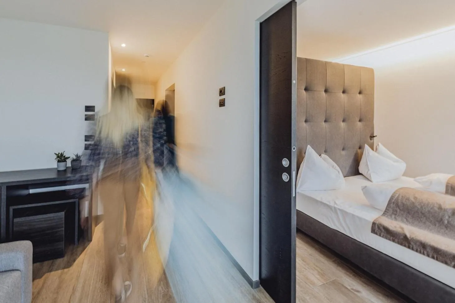 Living room, Bed in Hotel Raffl