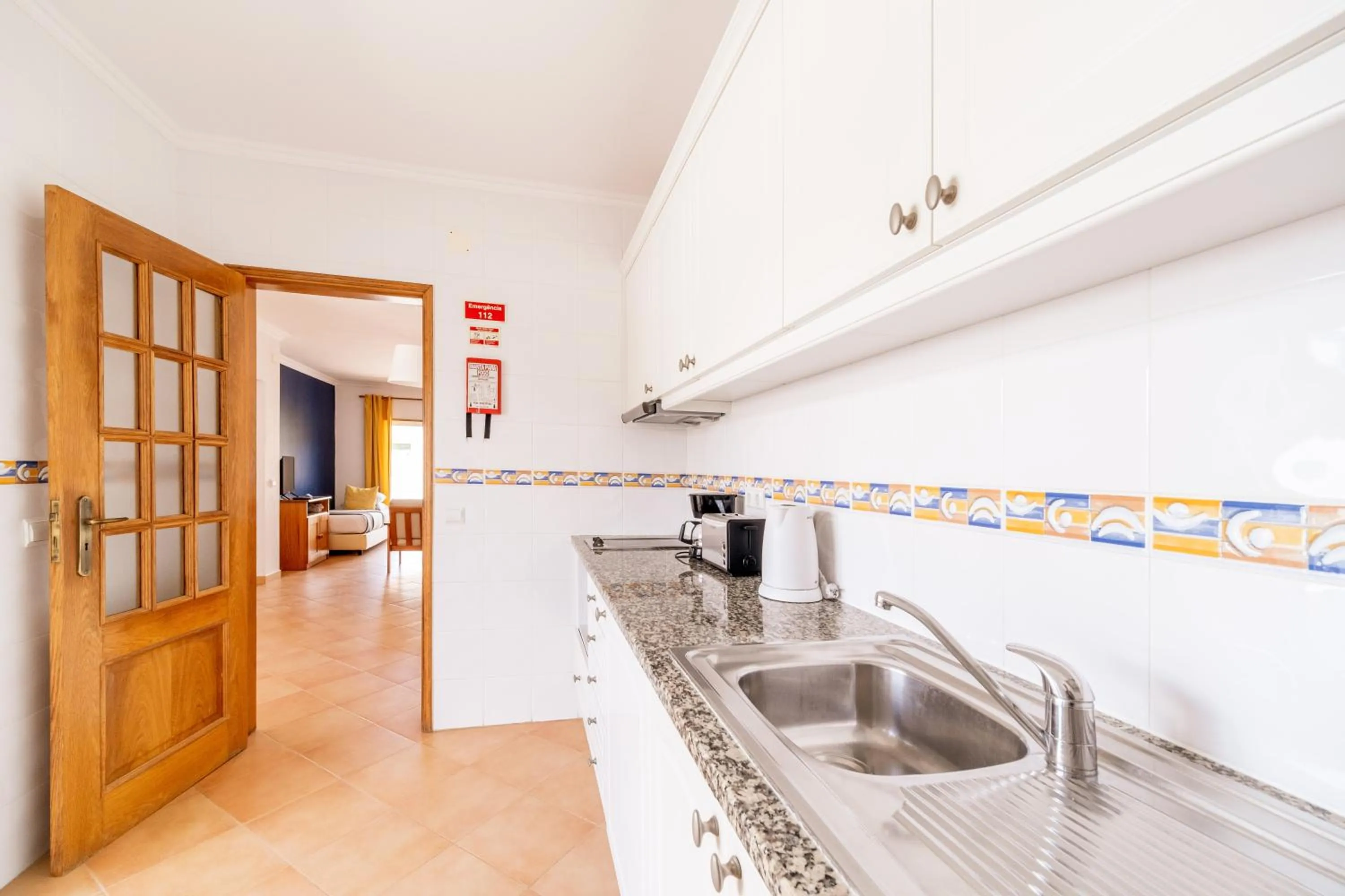 kitchen in Oasis Beach Apartments