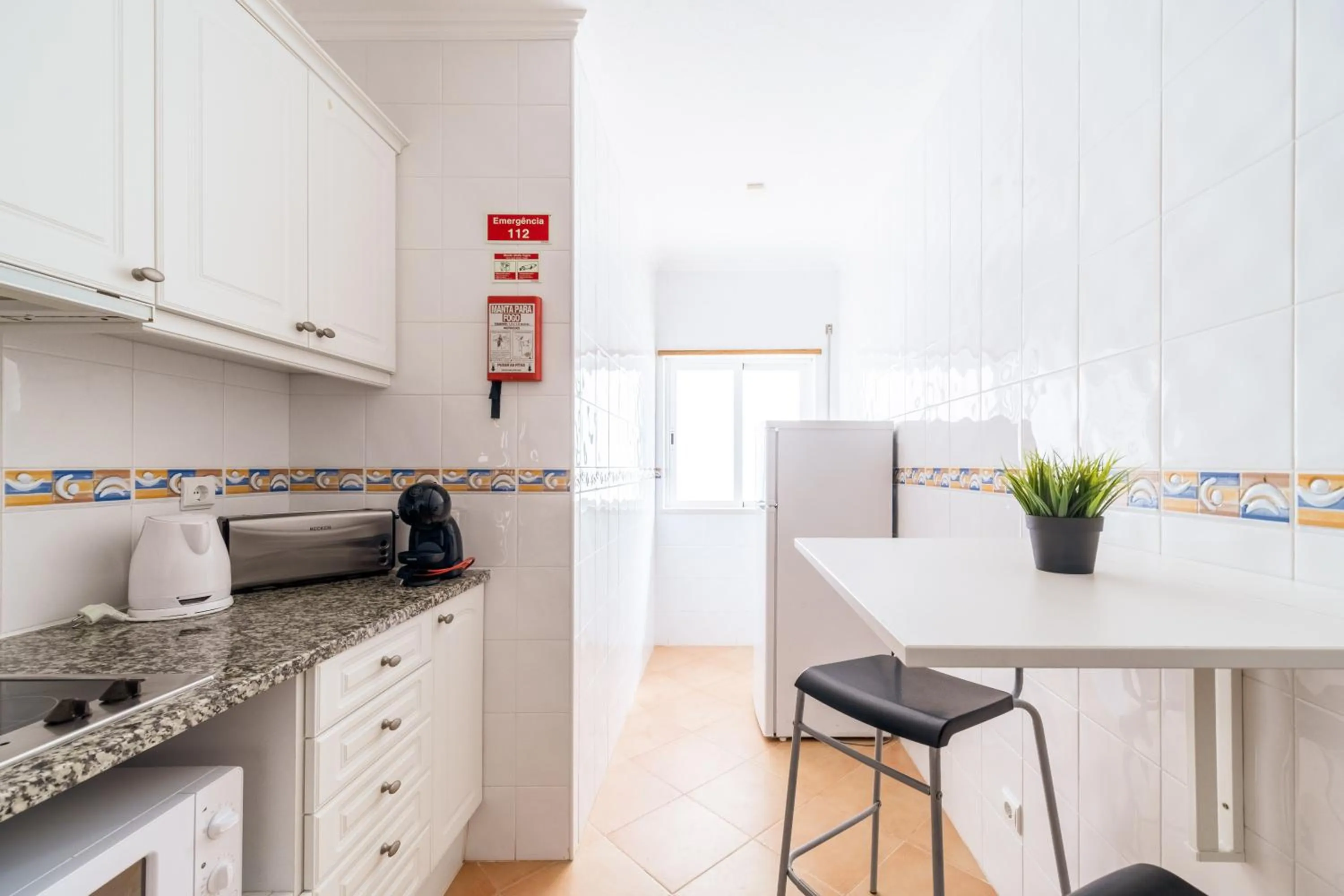 kitchen in Oasis Beach Apartments