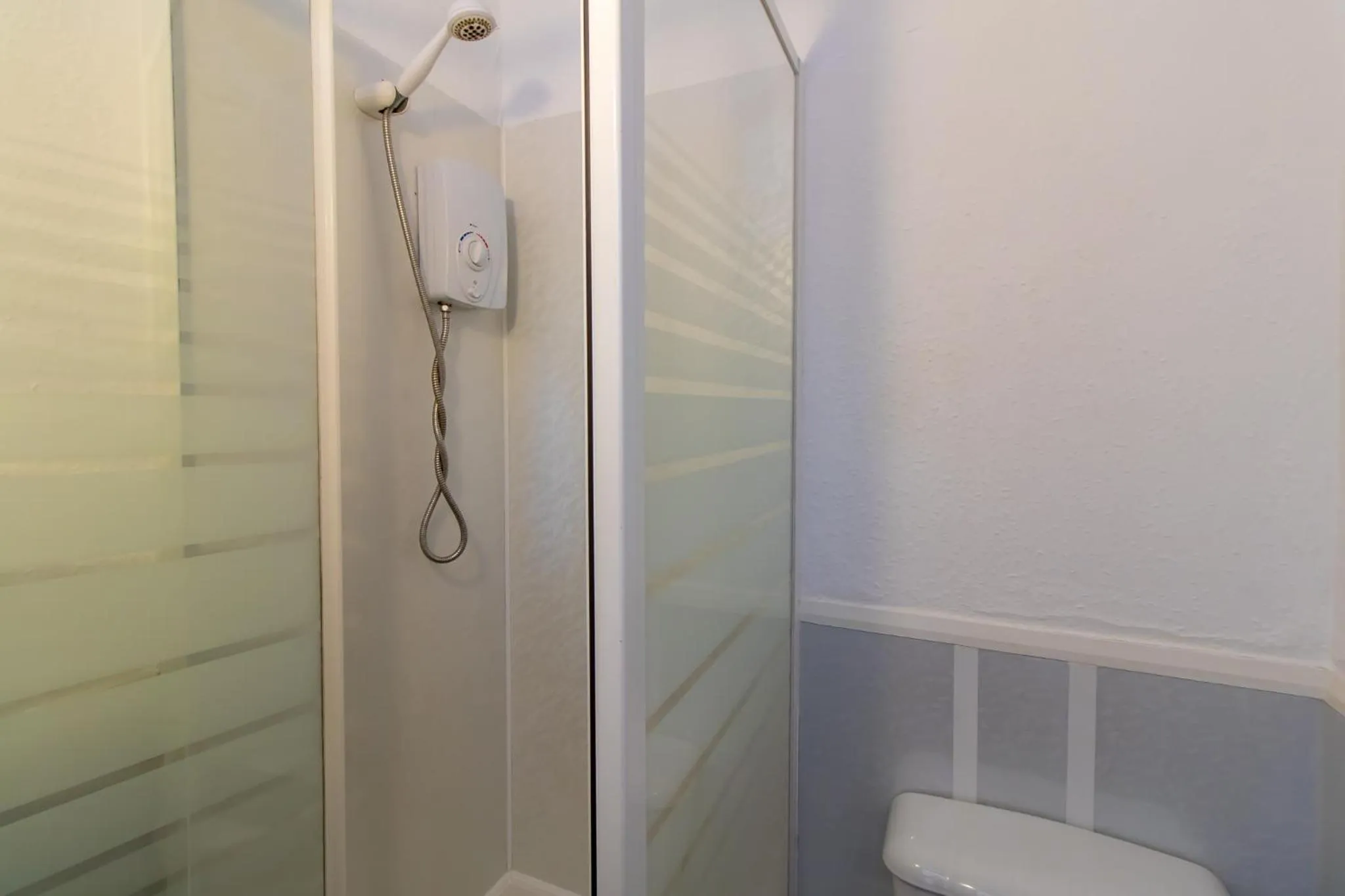 Bathroom in OYO The Bentleys Hotel