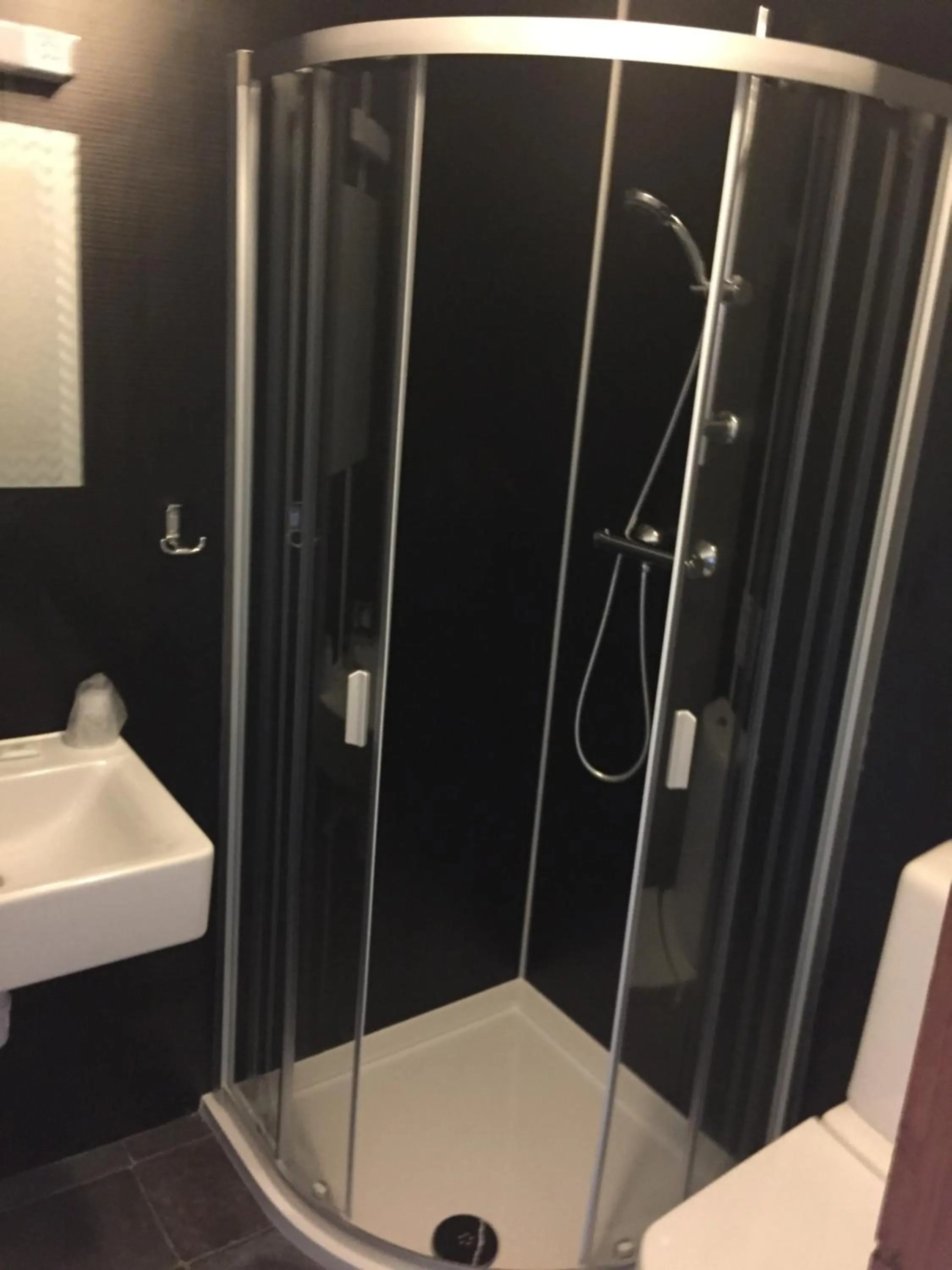 Bathroom in OYO The Bentleys Hotel