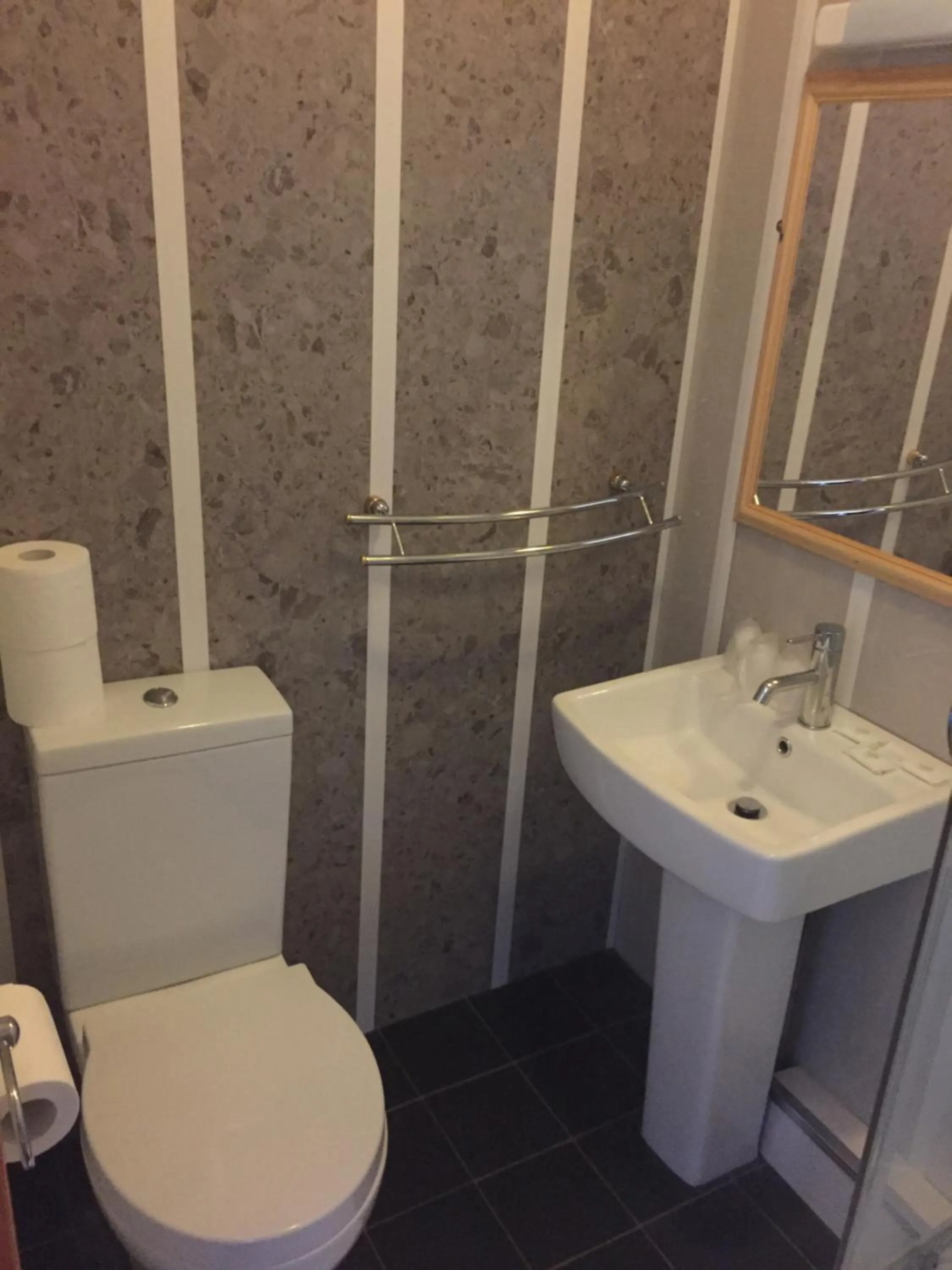 Bathroom in OYO The Bentleys Hotel