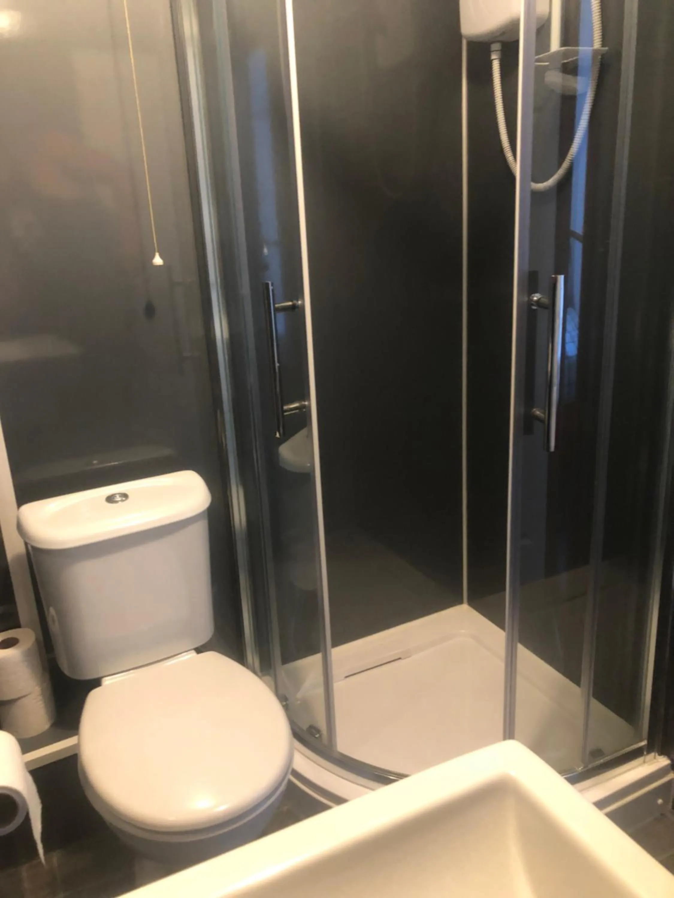 Bathroom in OYO The Bentleys Hotel