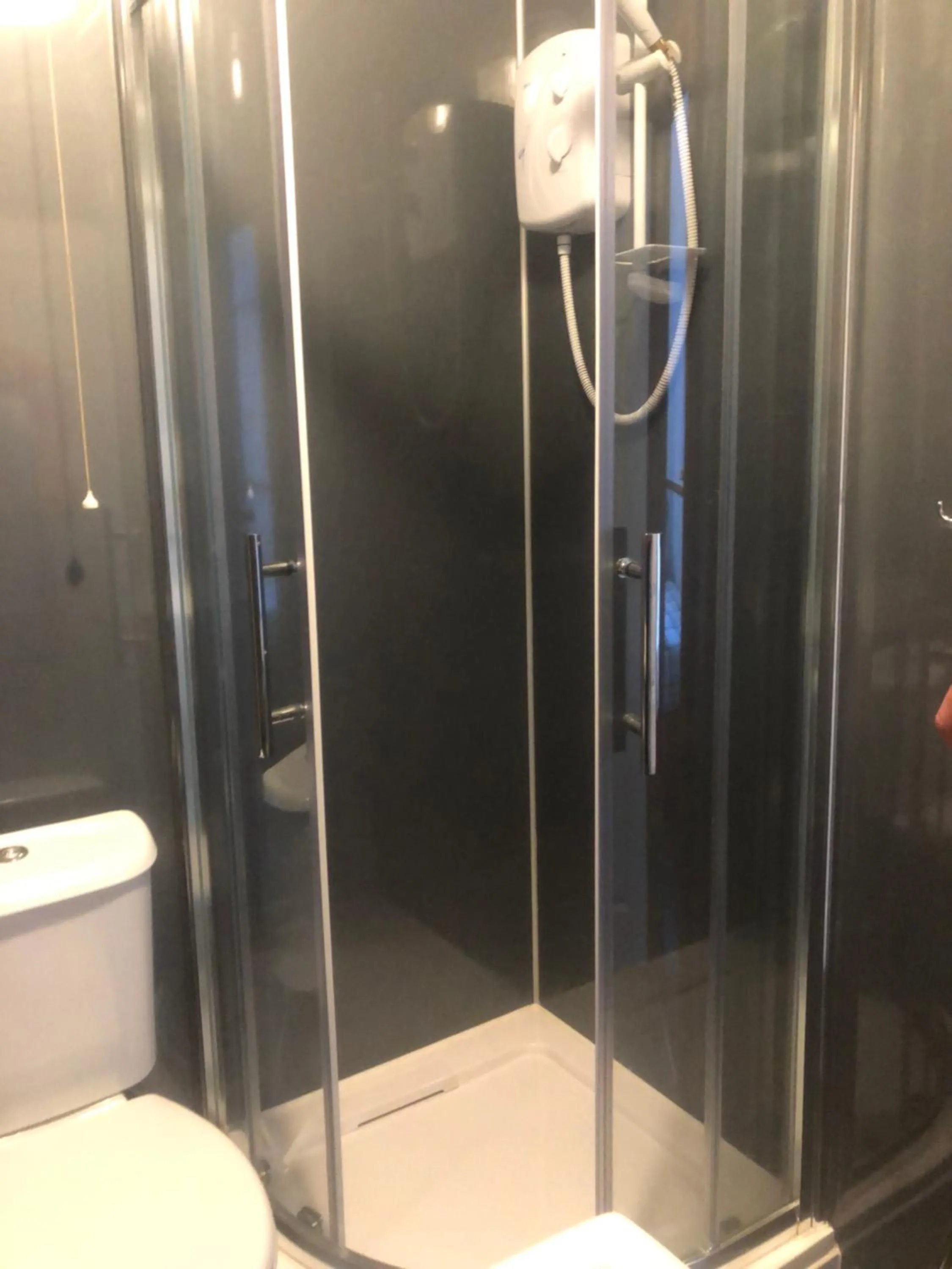 Bathroom in OYO The Bentleys Hotel