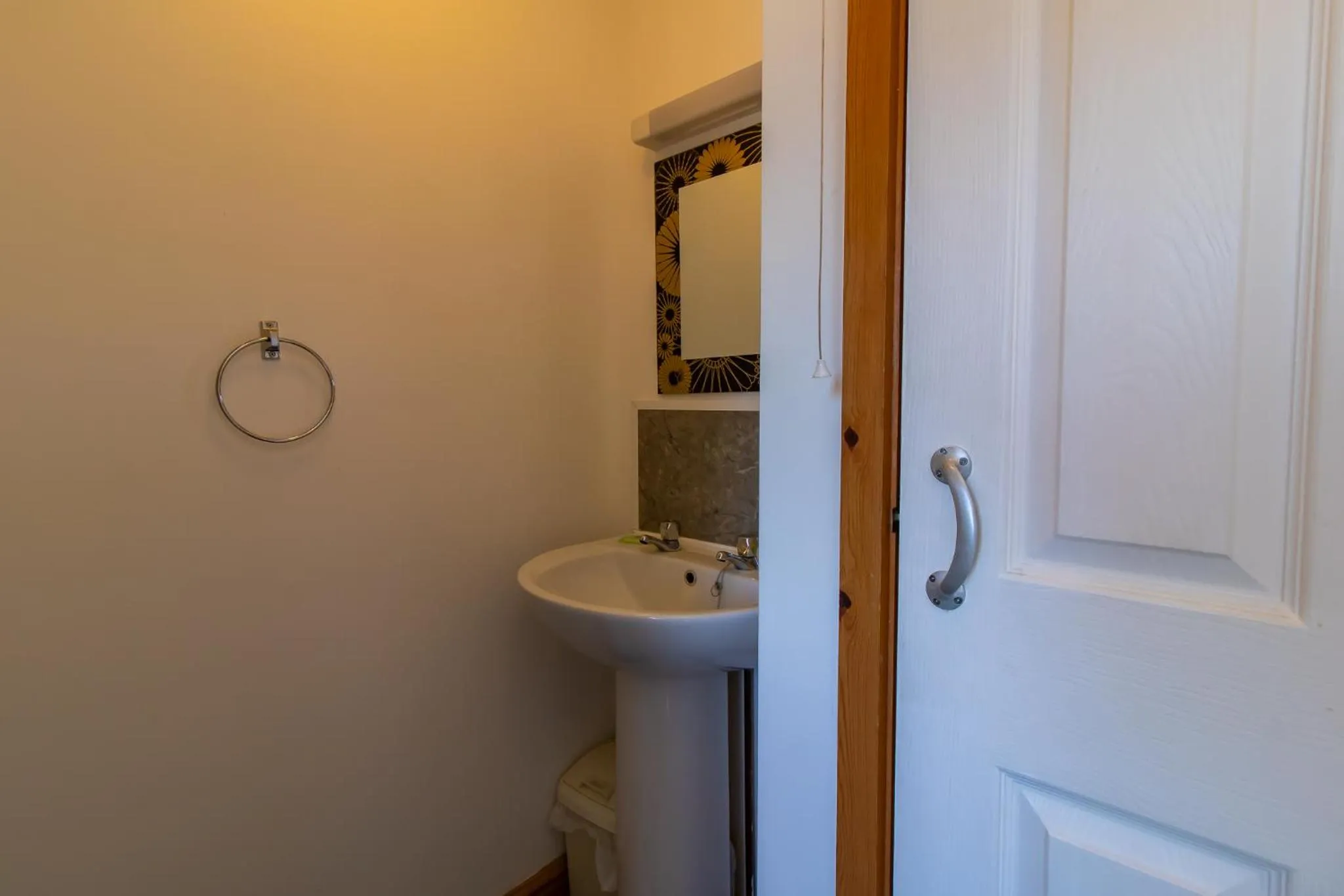 Bathroom in OYO The Bentleys Hotel