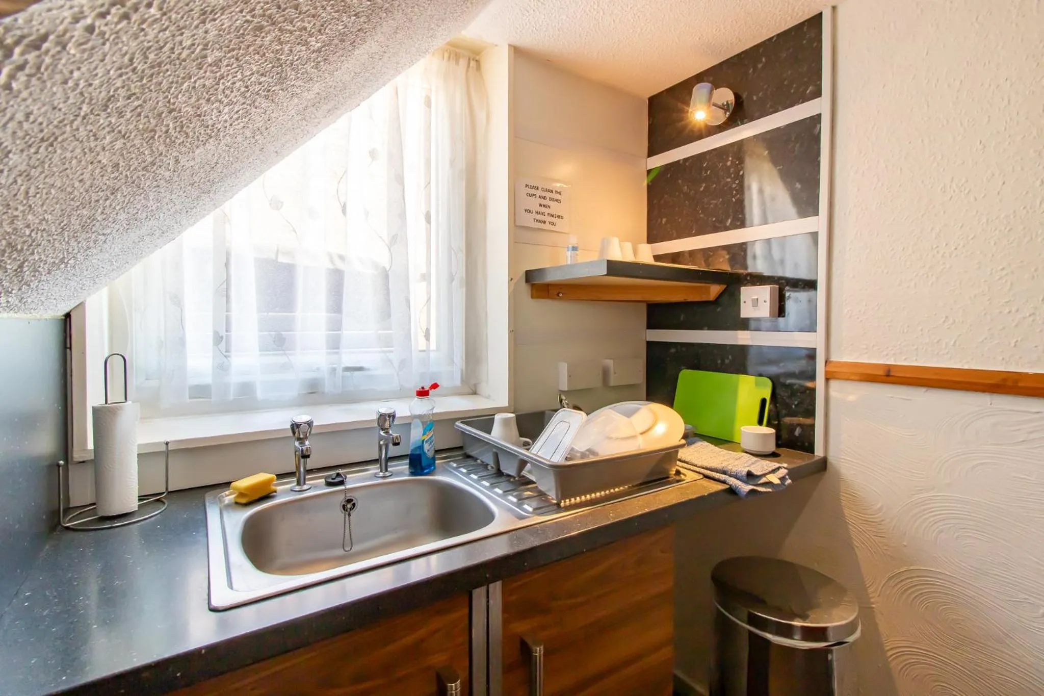 Kitchen or kitchenette in OYO The Bentleys Hotel