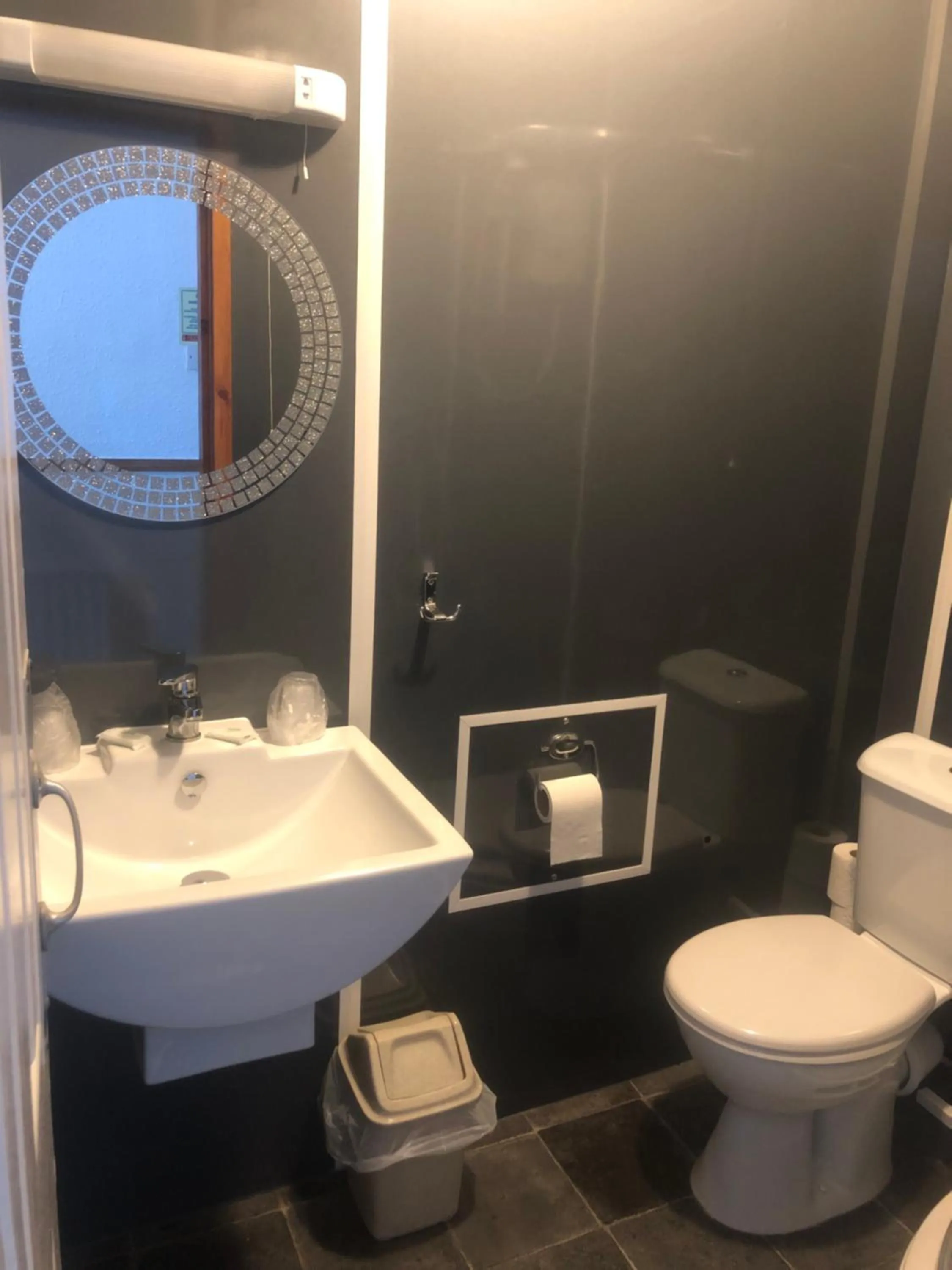 Bathroom in OYO The Bentleys Hotel