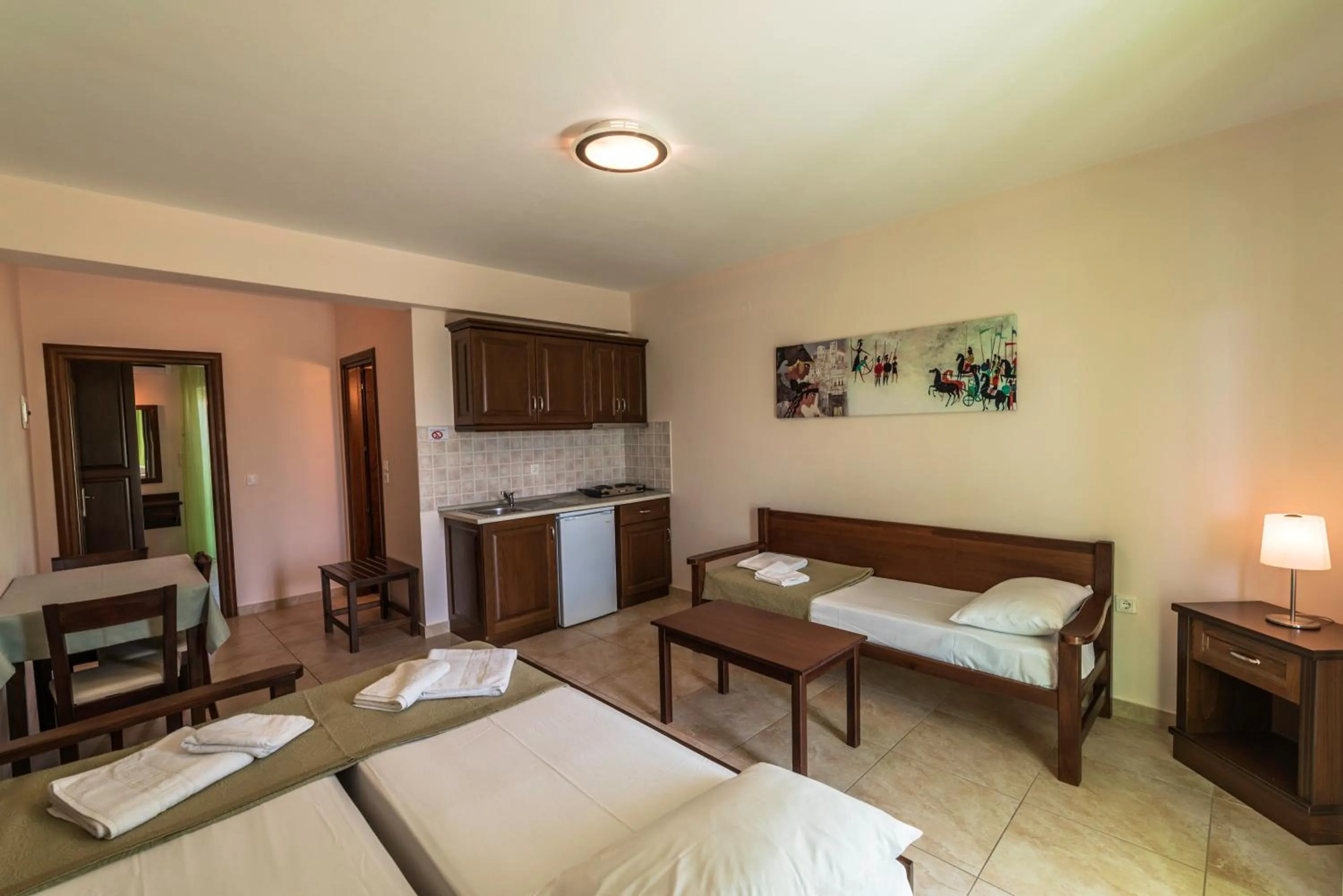 Bed in Zeus Apartments