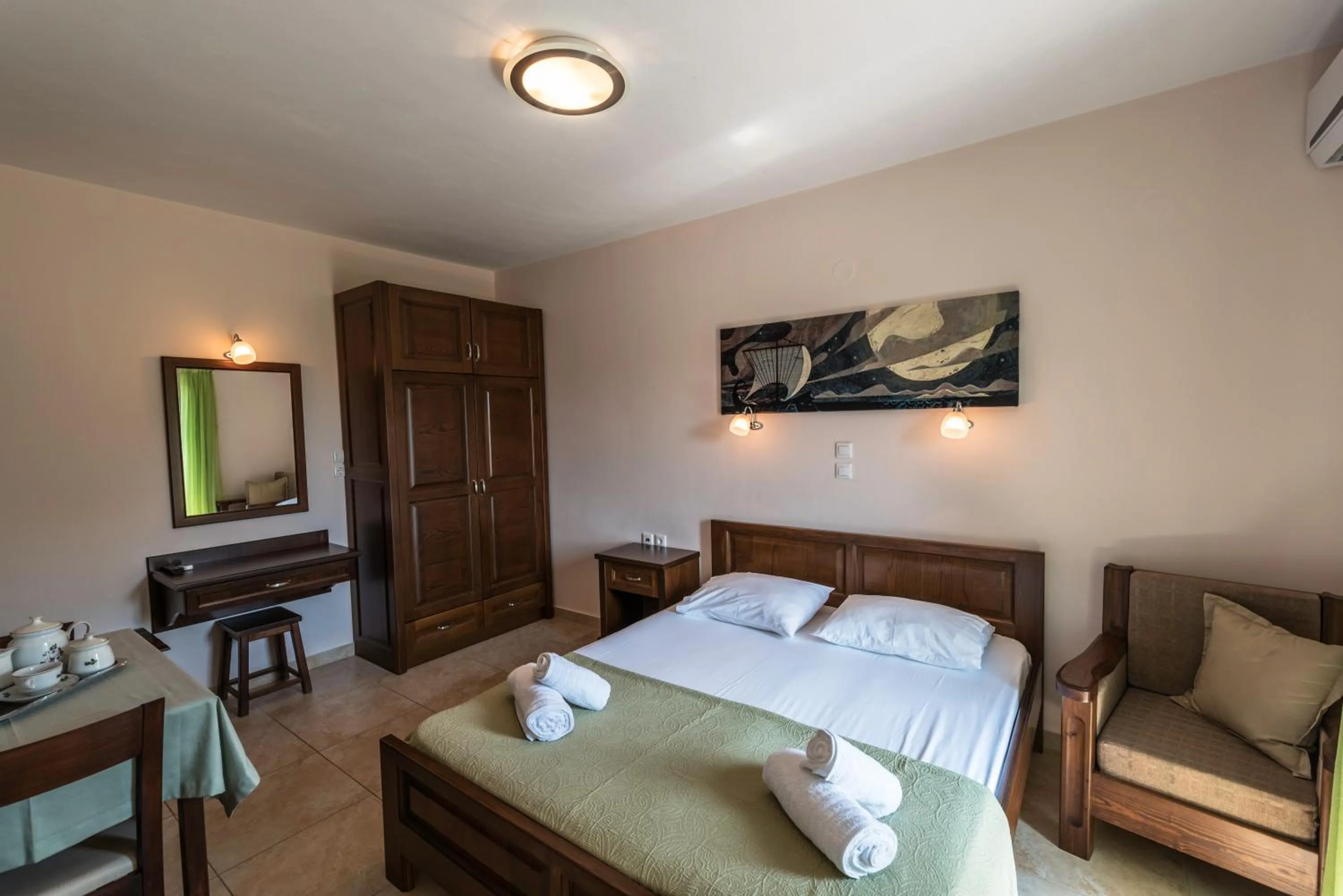 Bed in Zeus Apartments