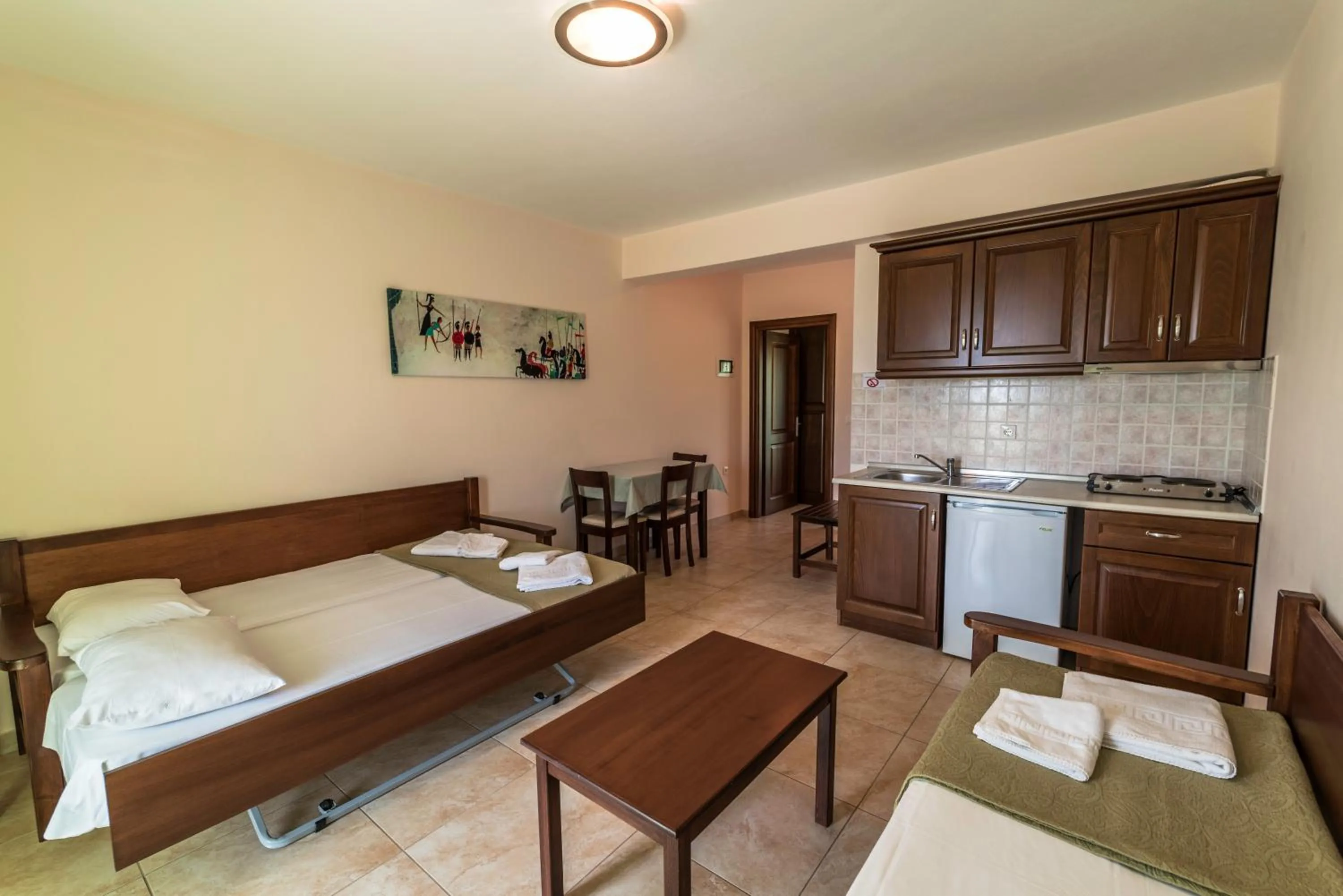 Bed in Zeus Apartments