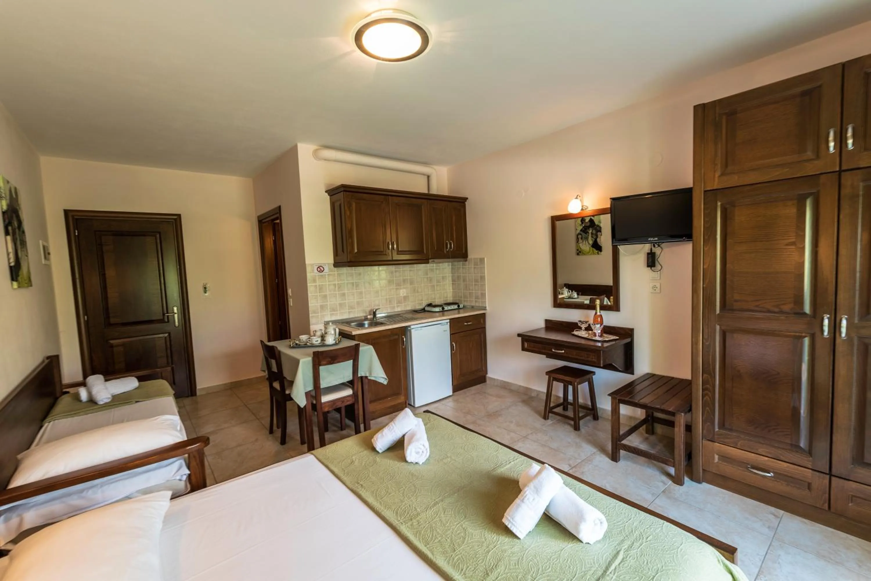 Bed in Zeus Apartments