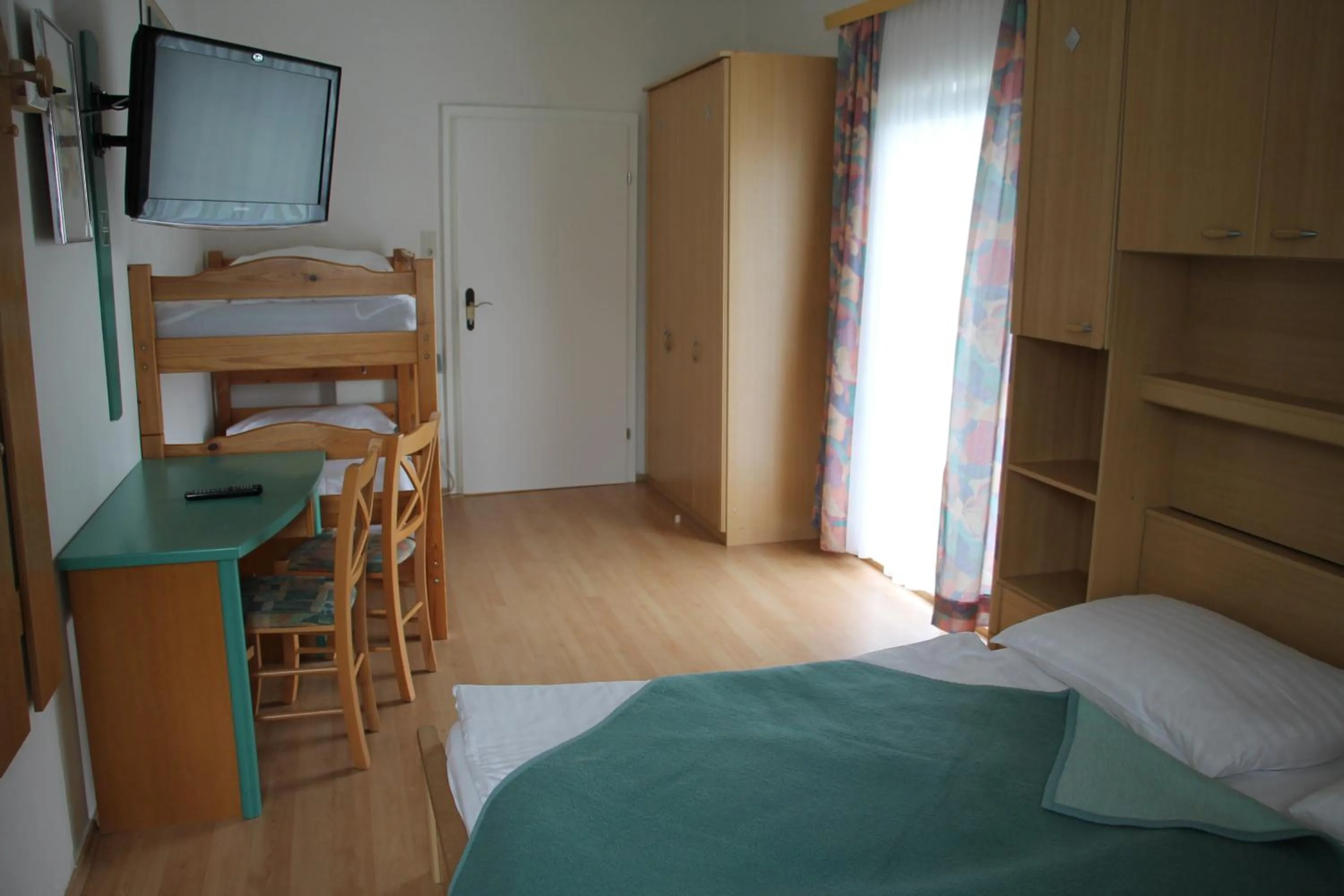 Bedroom in Strandhotel Pichler