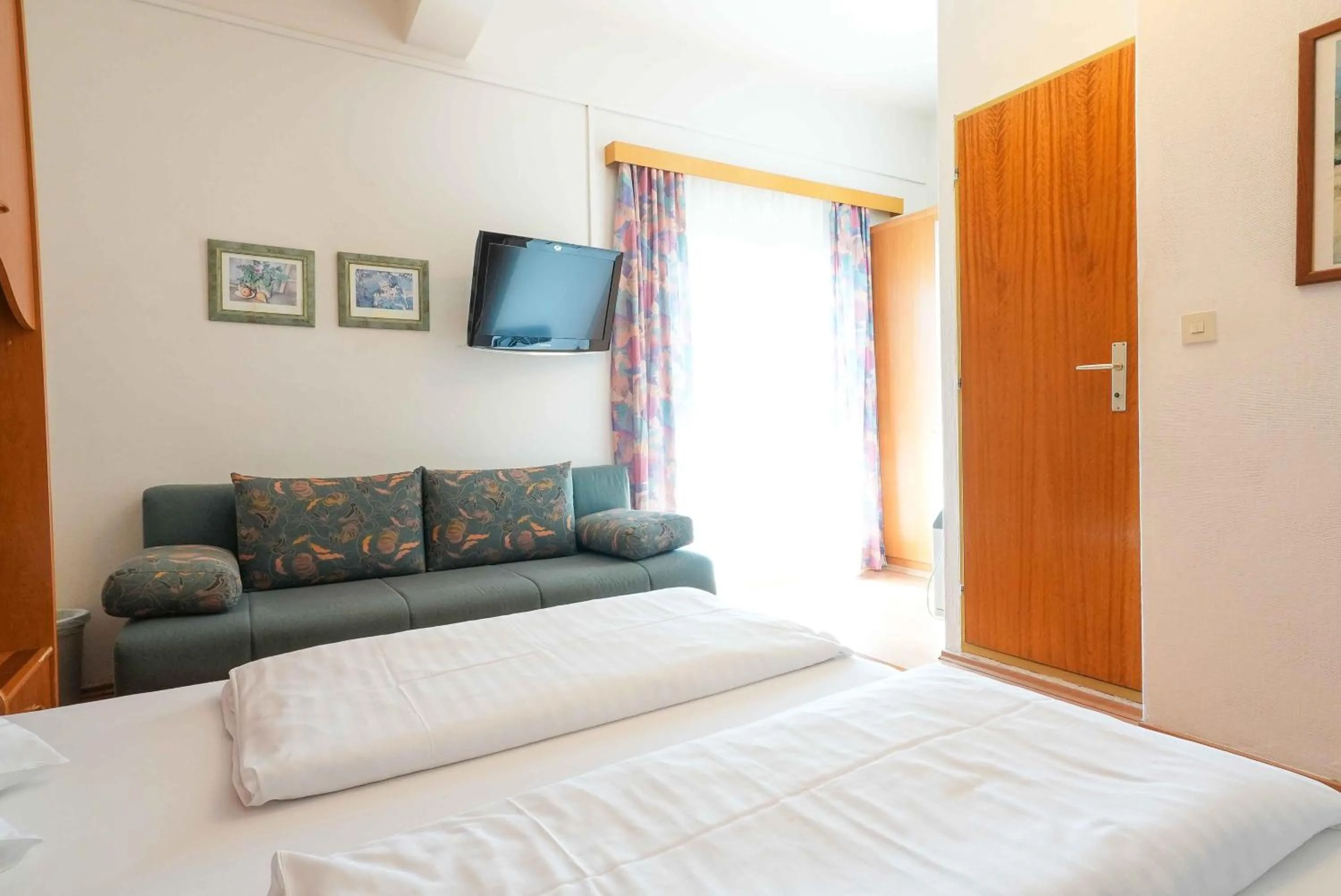 Bedroom in Strandhotel Pichler