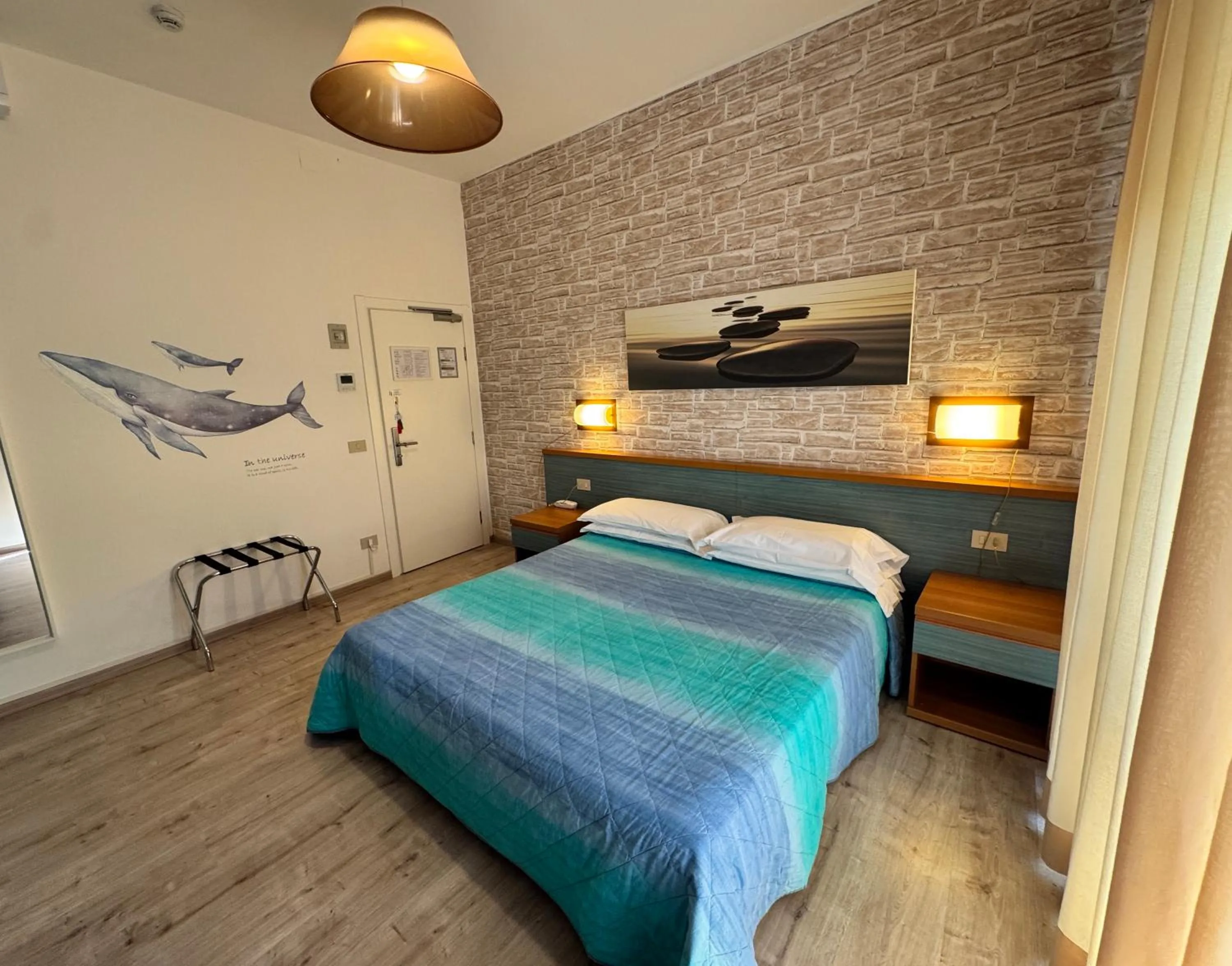 Photo of the whole room, Bed in Regina Urban Beach Hotel