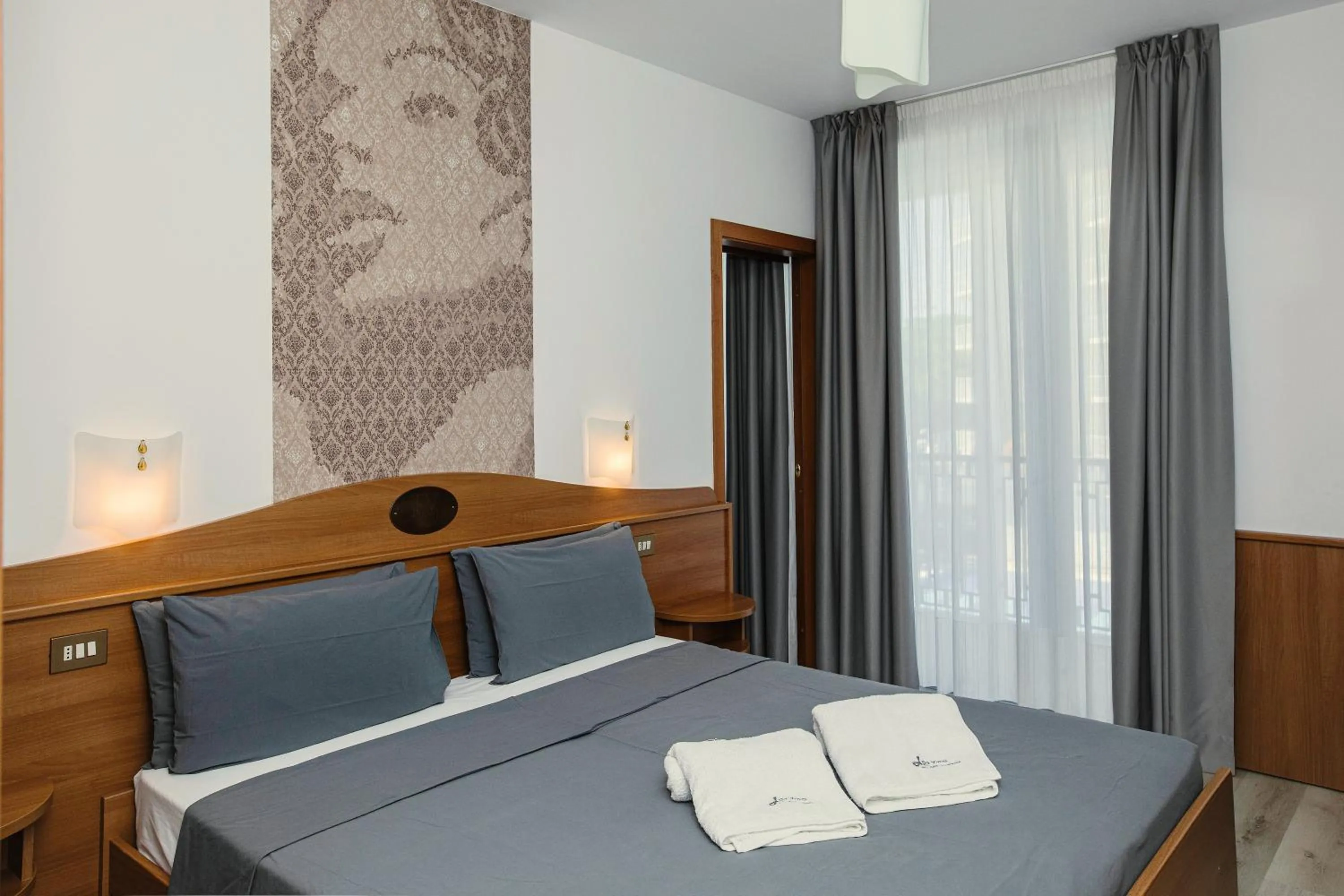 Bed in Hotel Leonardo Da Vinci Wellness SPA