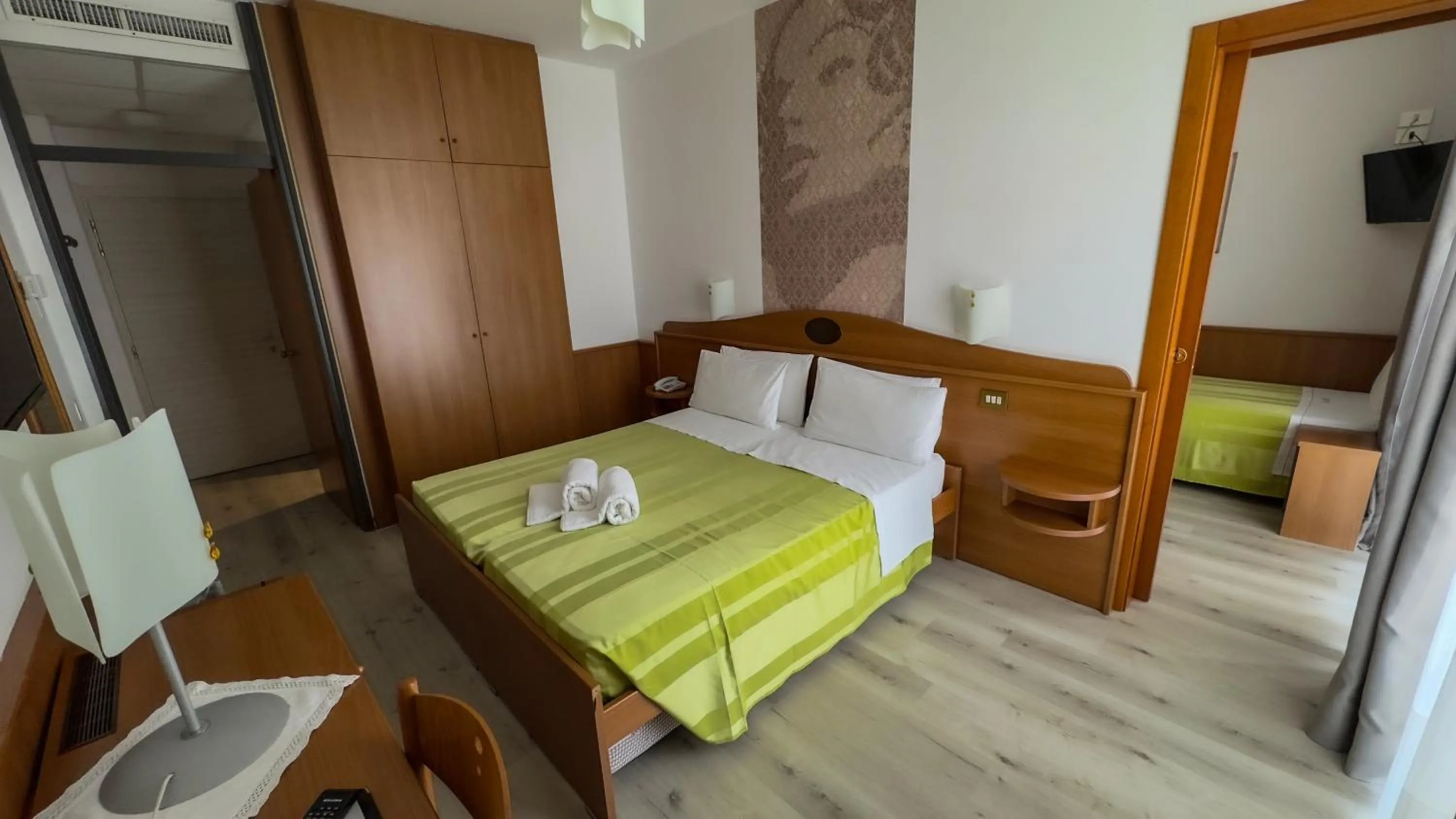 Bed in Hotel Leonardo Da Vinci Wellness SPA