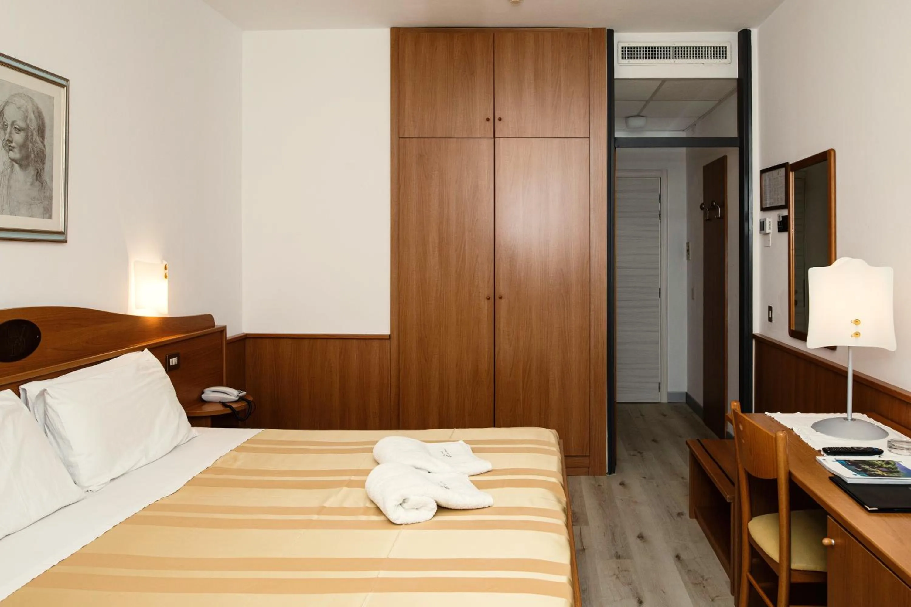 Bed in Hotel Leonardo Da Vinci Wellness SPA