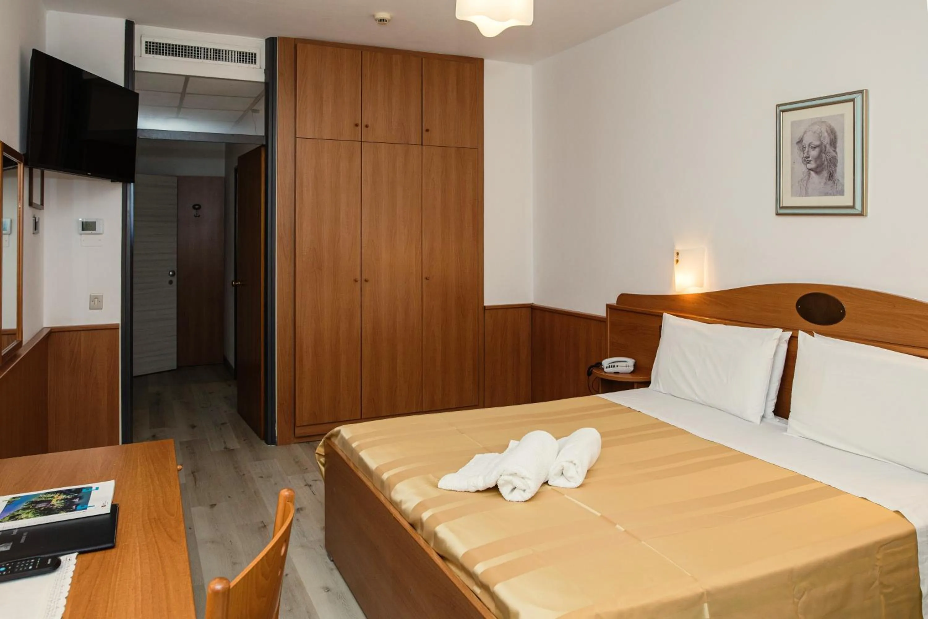 Bed in Hotel Leonardo Da Vinci Wellness SPA