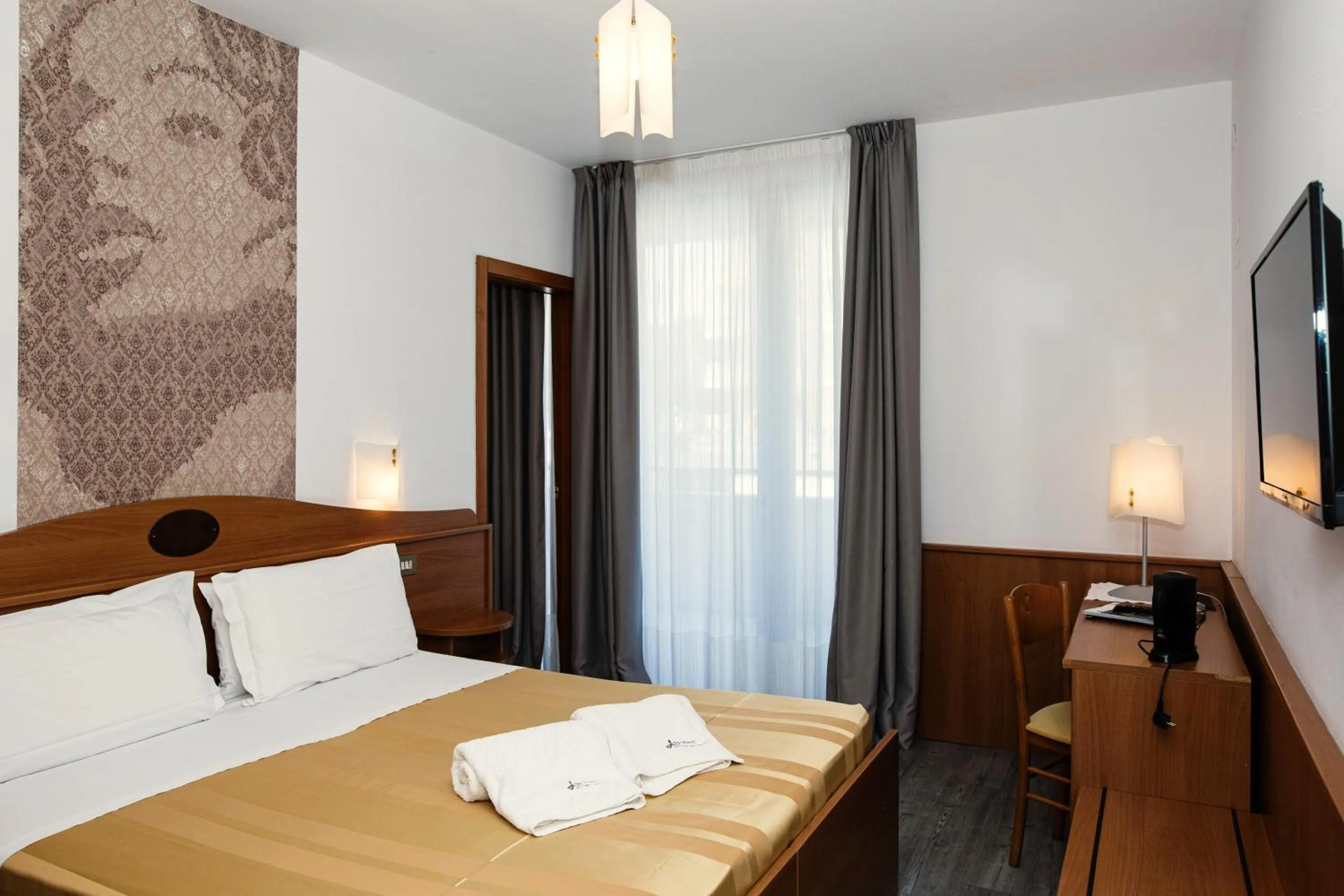 Bed in Hotel Leonardo Da Vinci Wellness SPA