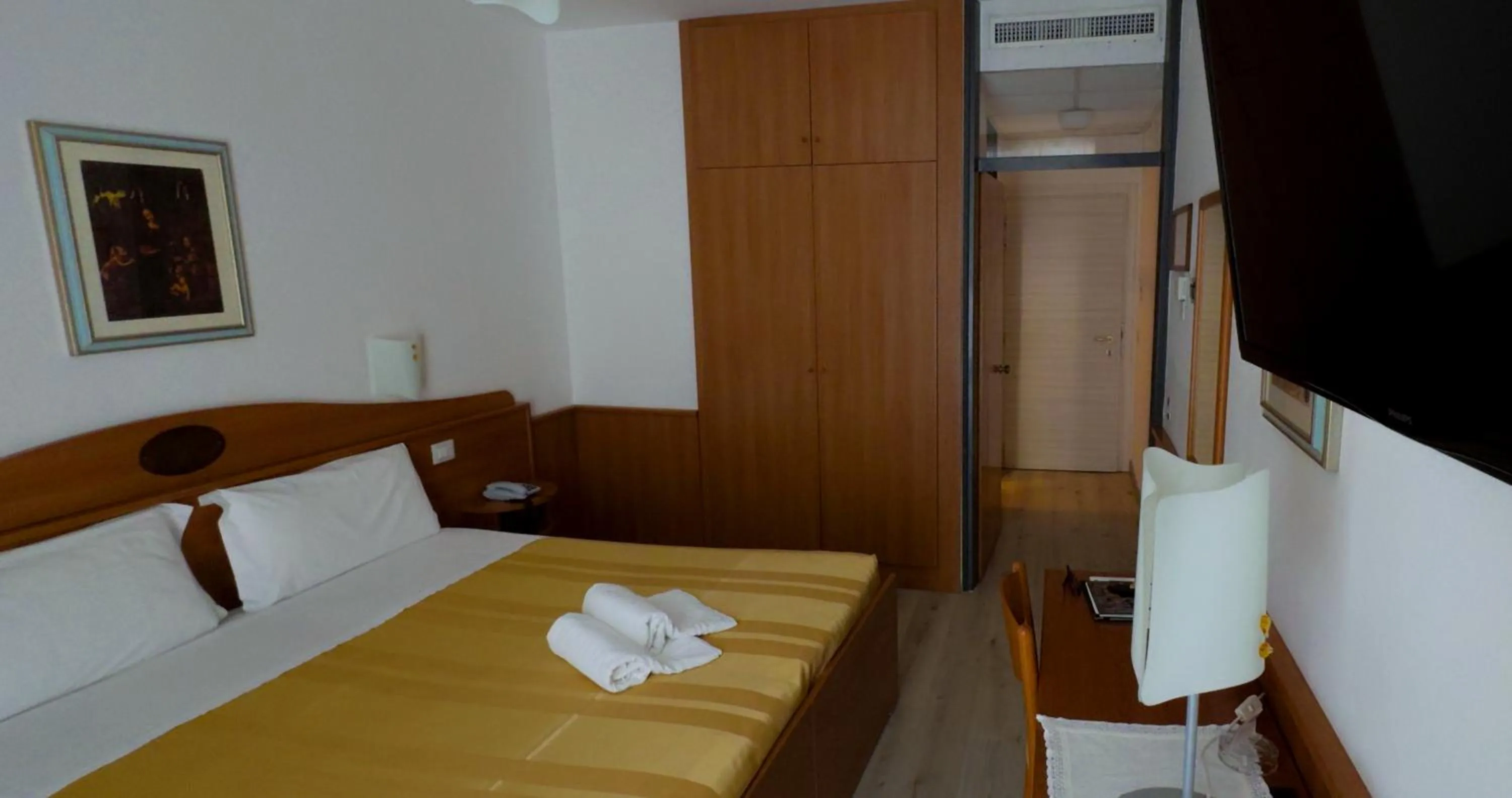 Bed in Hotel Leonardo Da Vinci Wellness SPA