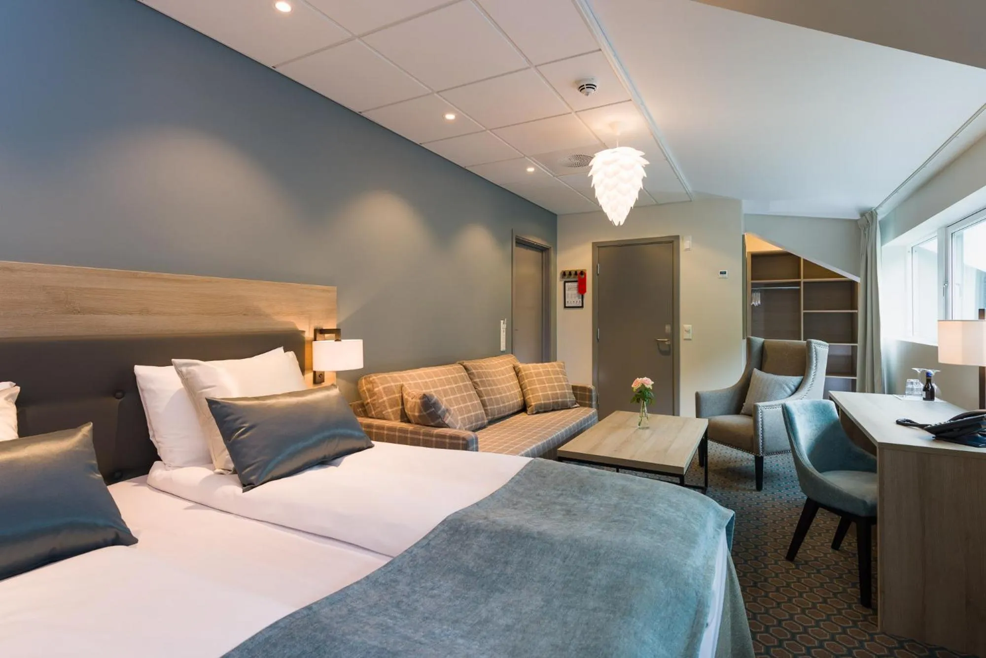 Bed in Fru Haugans Hotel