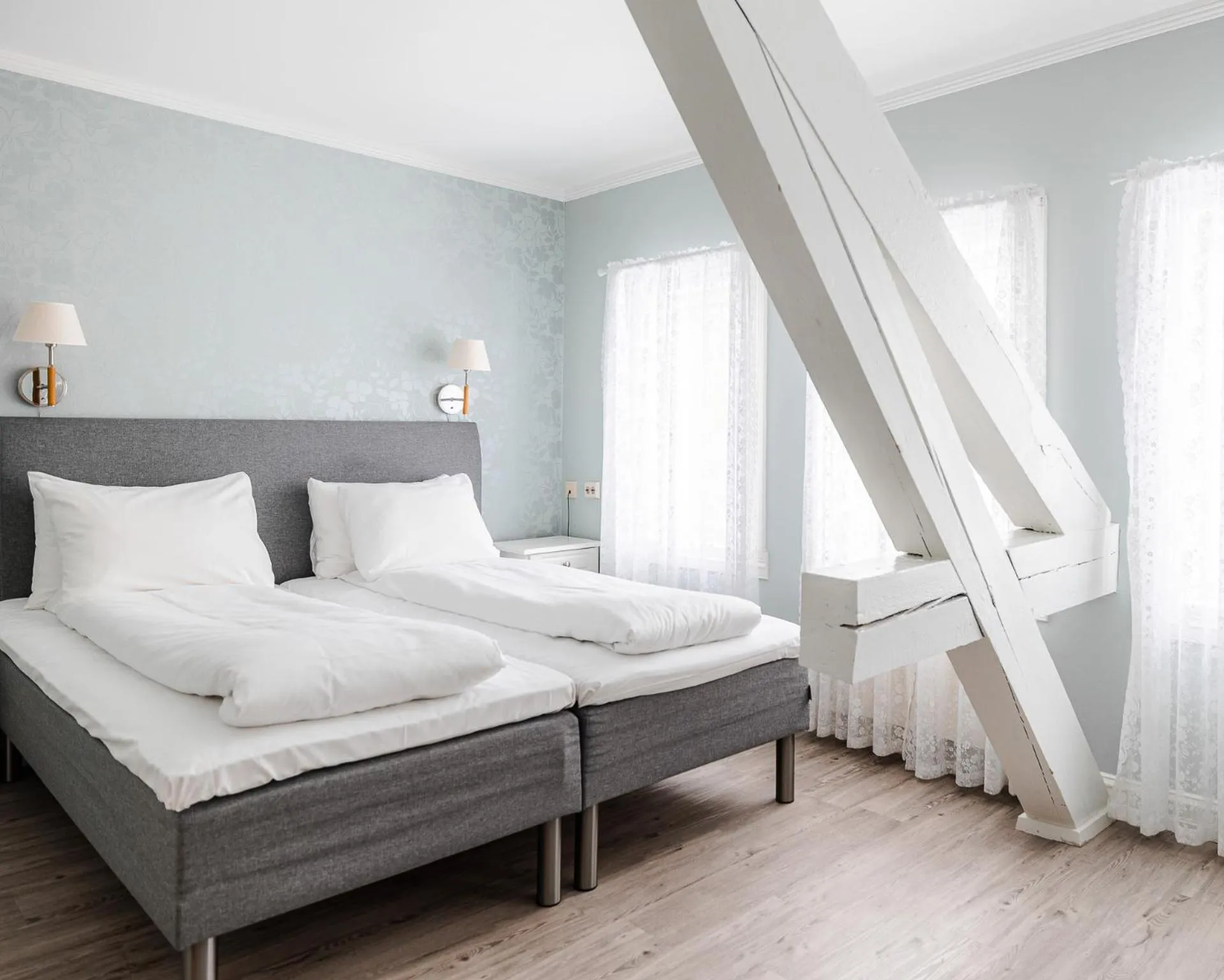 Bed in Fru Haugans Hotel