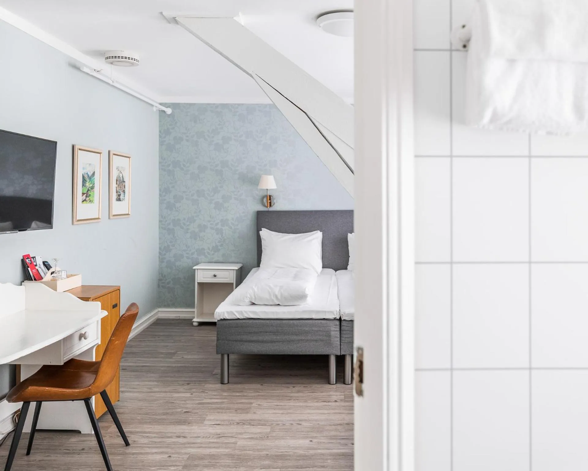 Bed in Fru Haugans Hotel