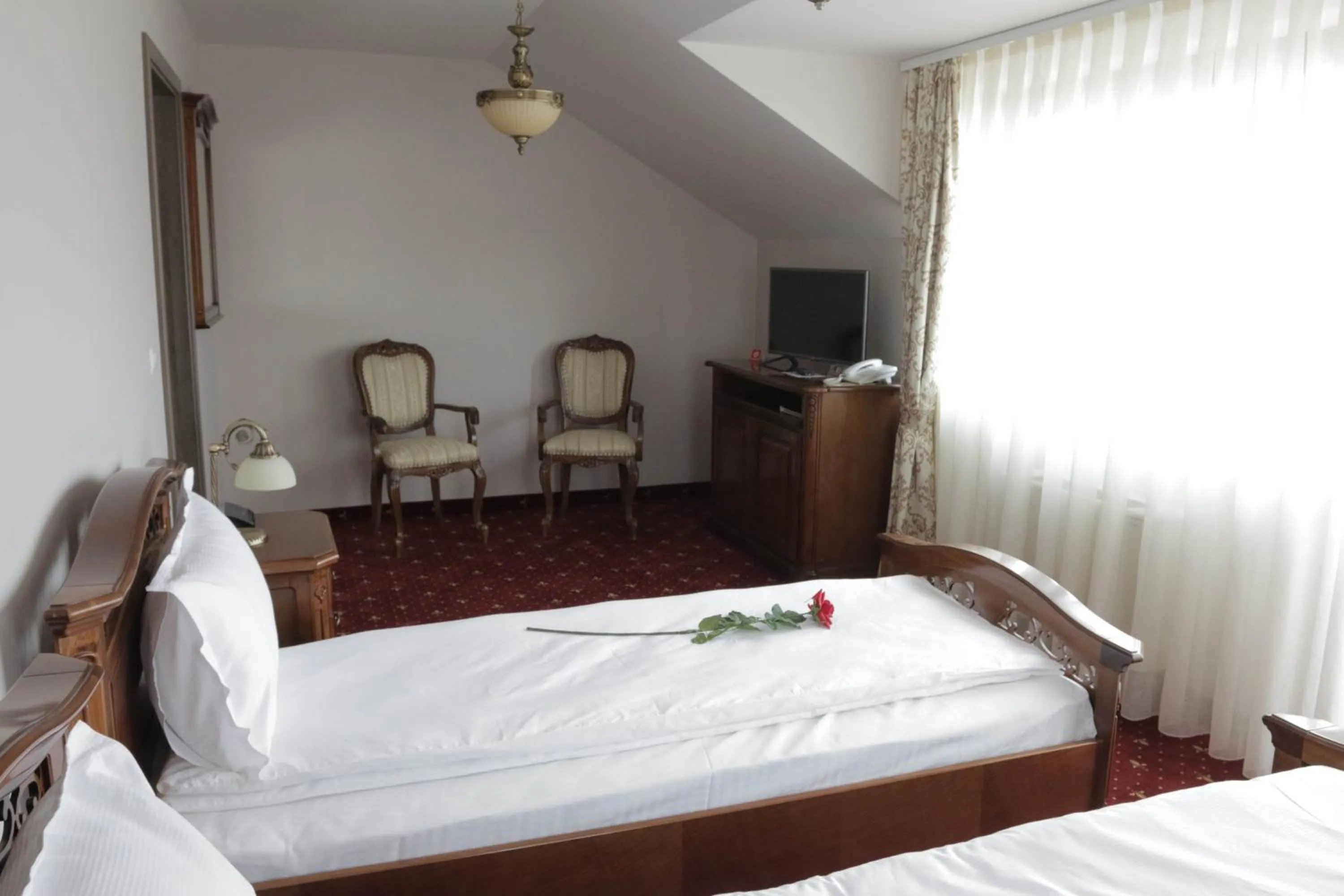 Bed in Hotel Slavia