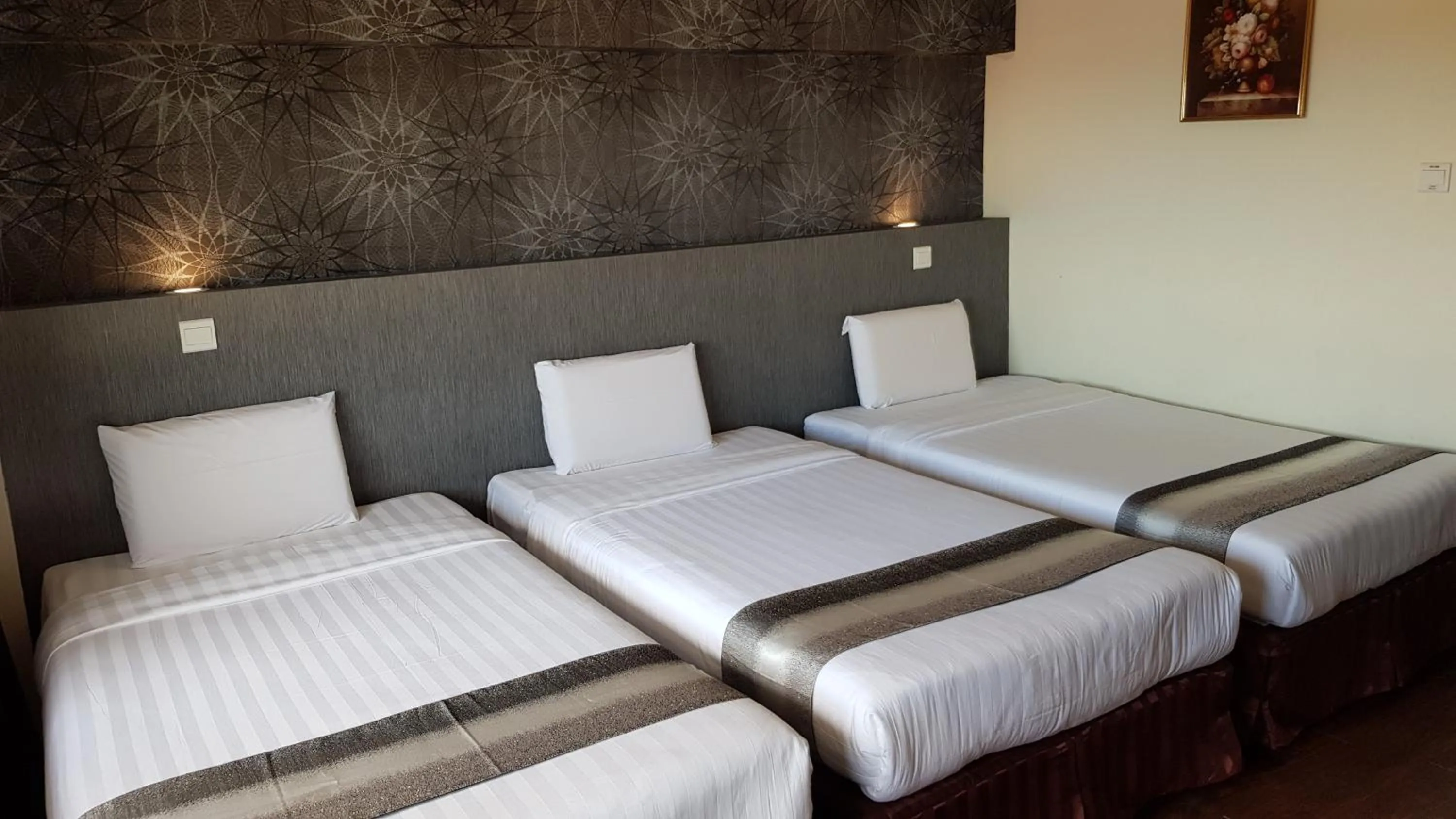 Bed in Check Inn Hotel Tawau