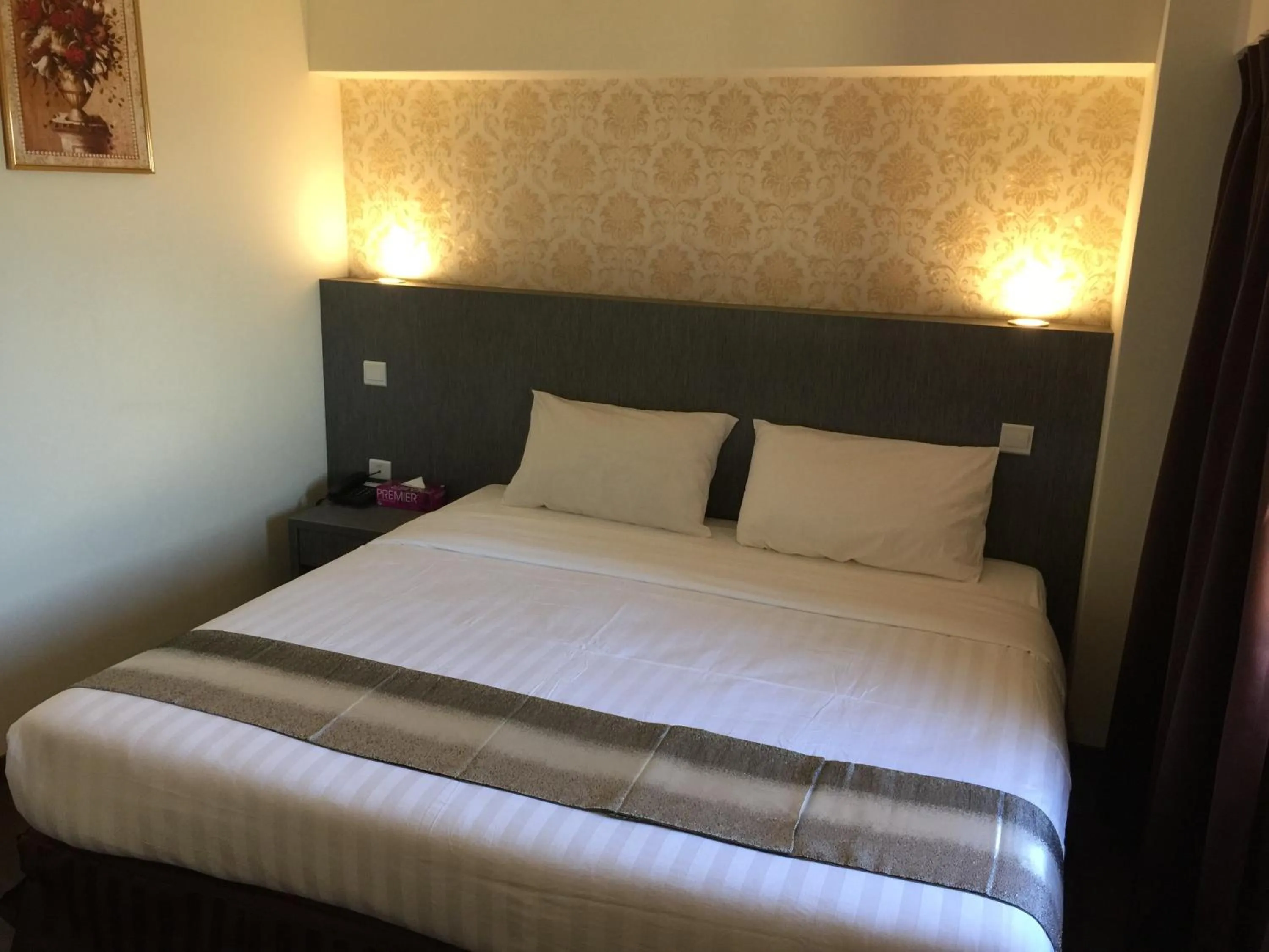 Bed in Check Inn Hotel Tawau