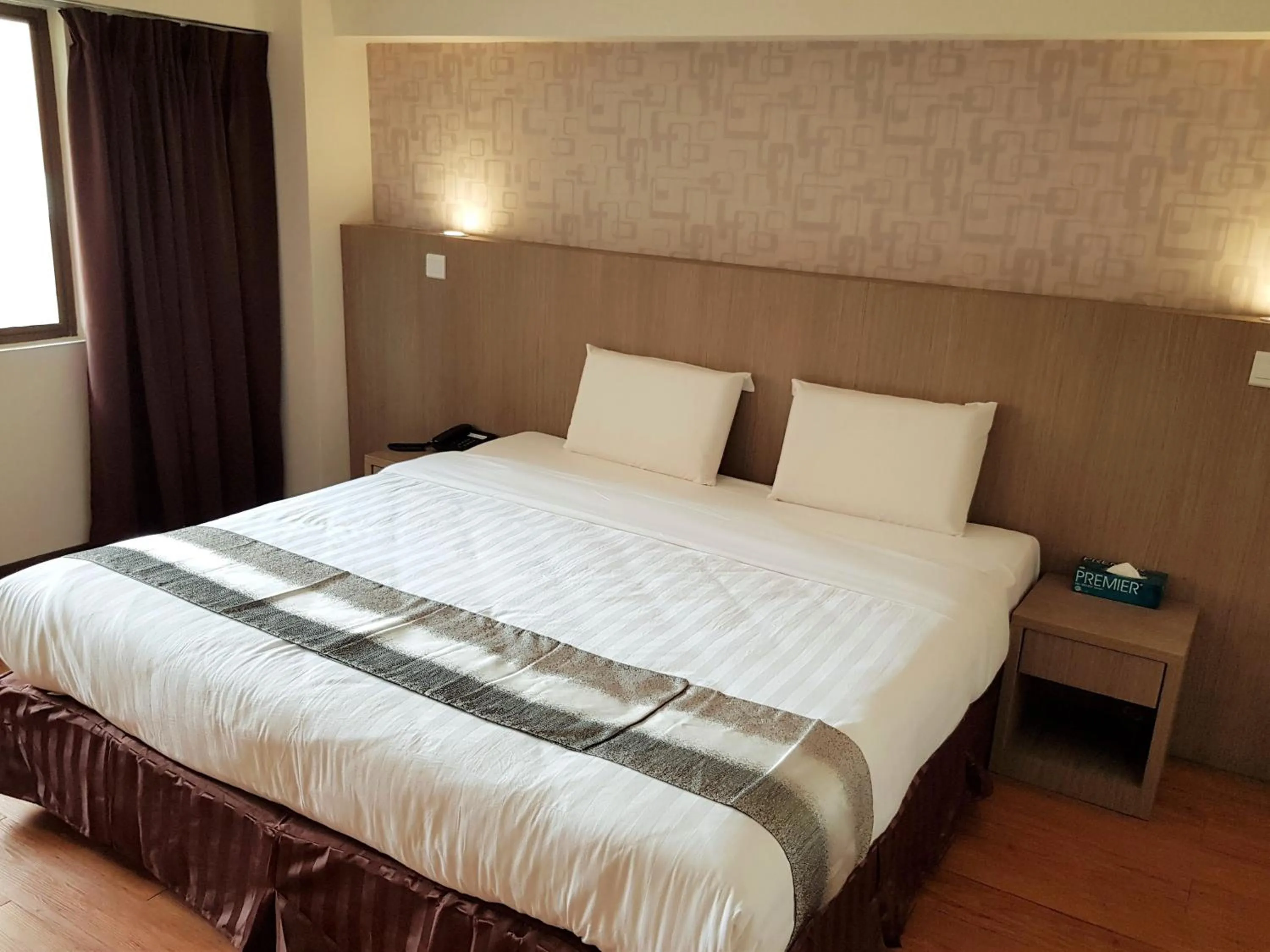 Bed in Check Inn Hotel Tawau