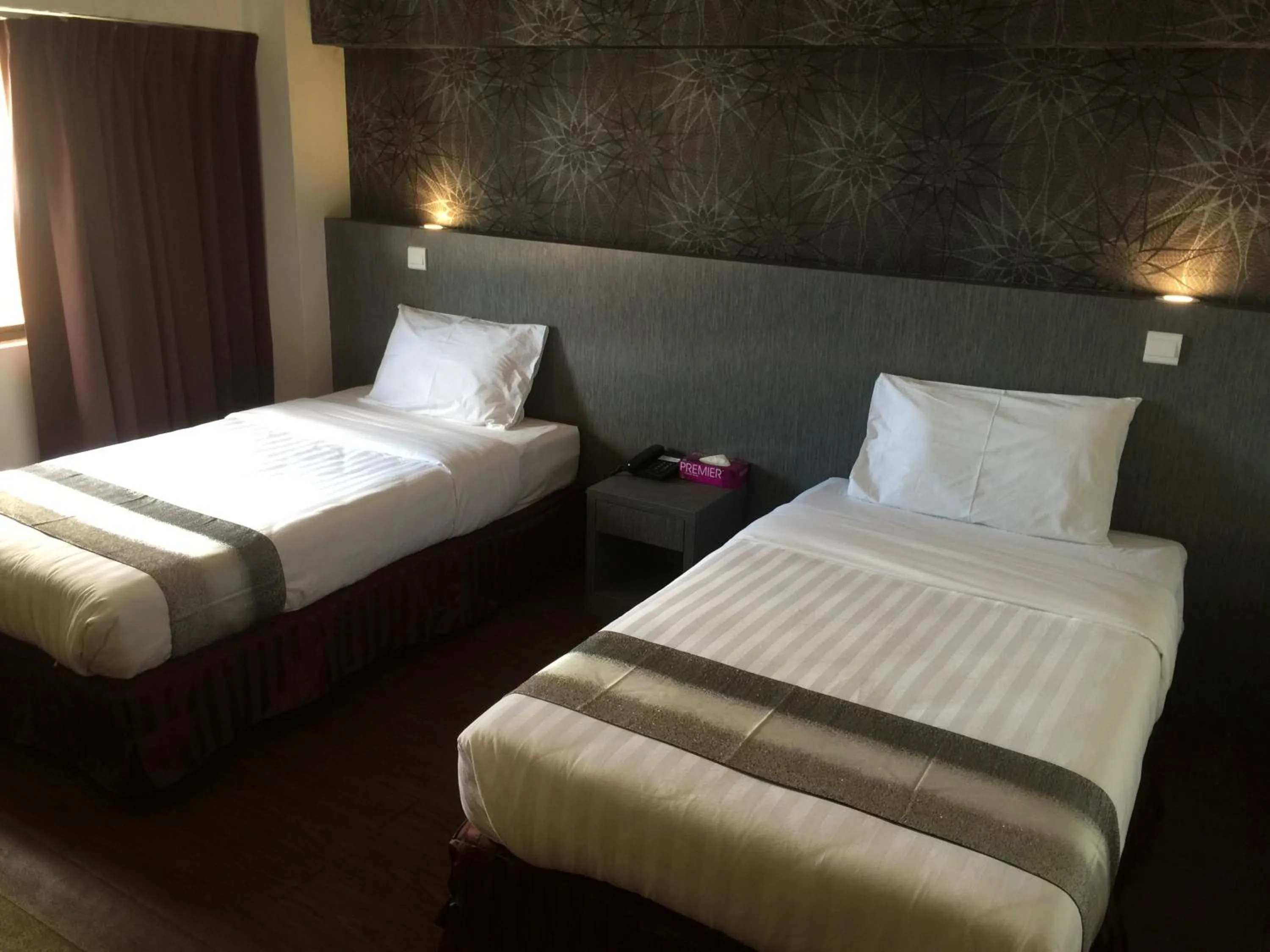 Bed in Check Inn Hotel Tawau