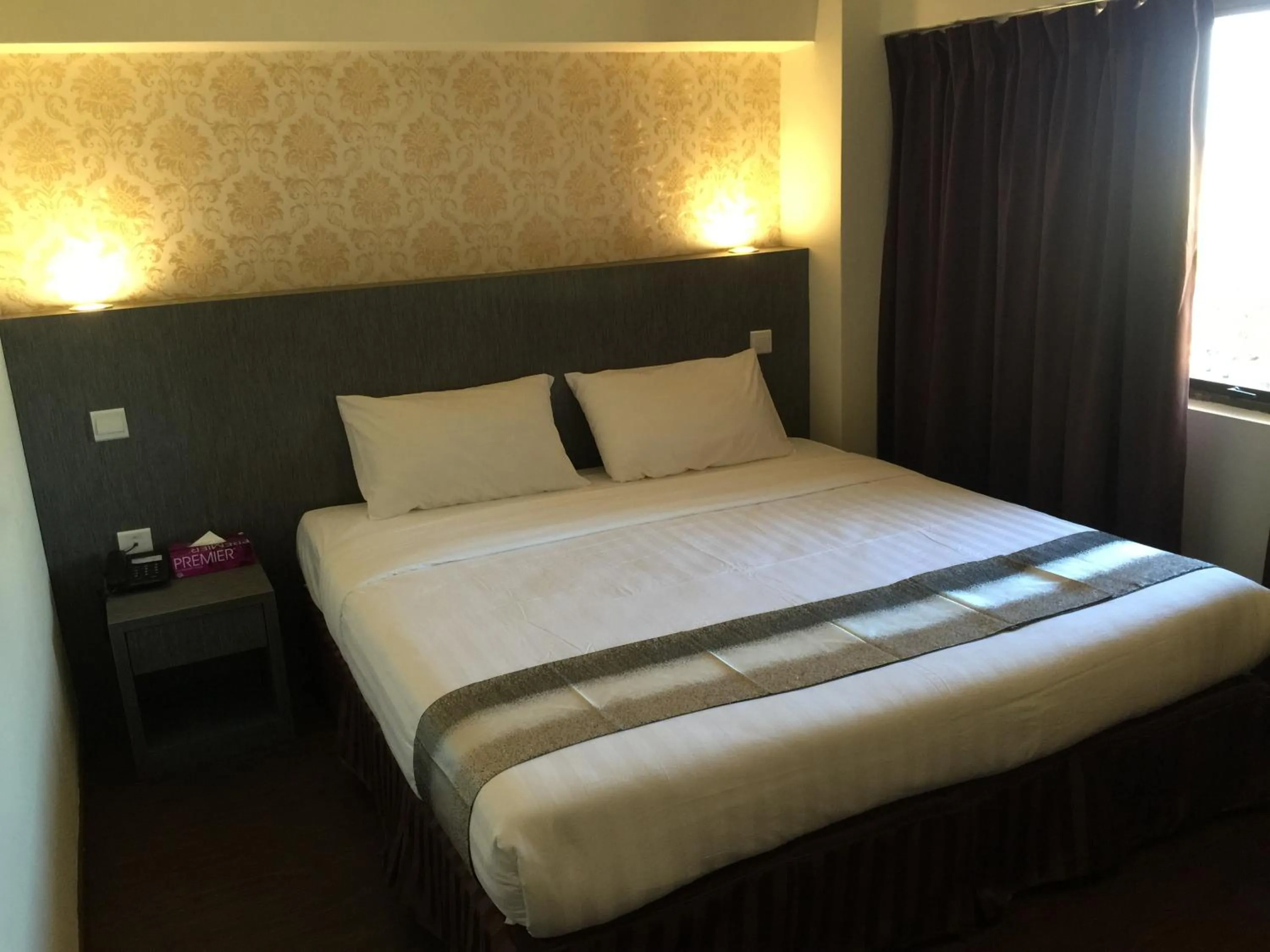 Bed in Check Inn Hotel Tawau