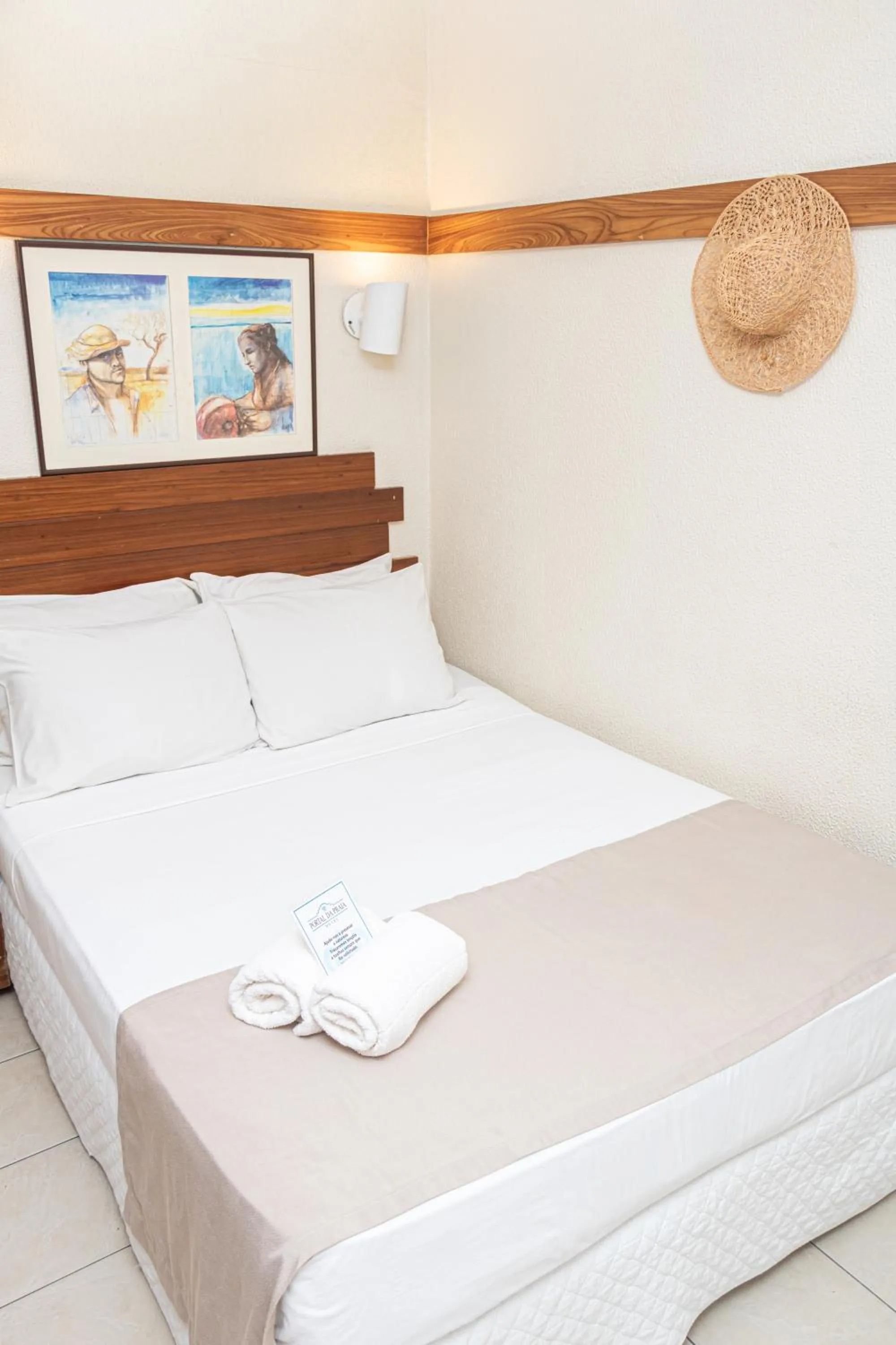 Bed in Portal Da Praia Hotel
