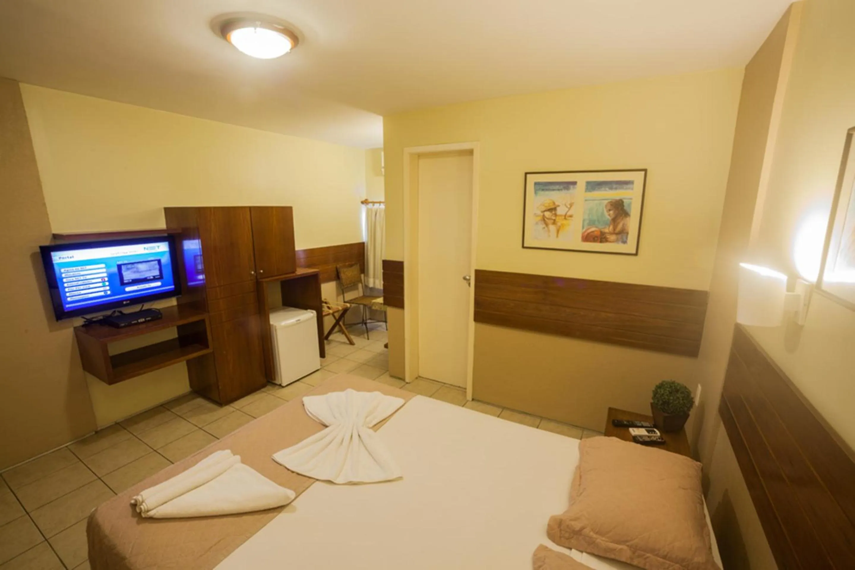 Photo of the whole room, Bed in Portal Da Praia Hotel