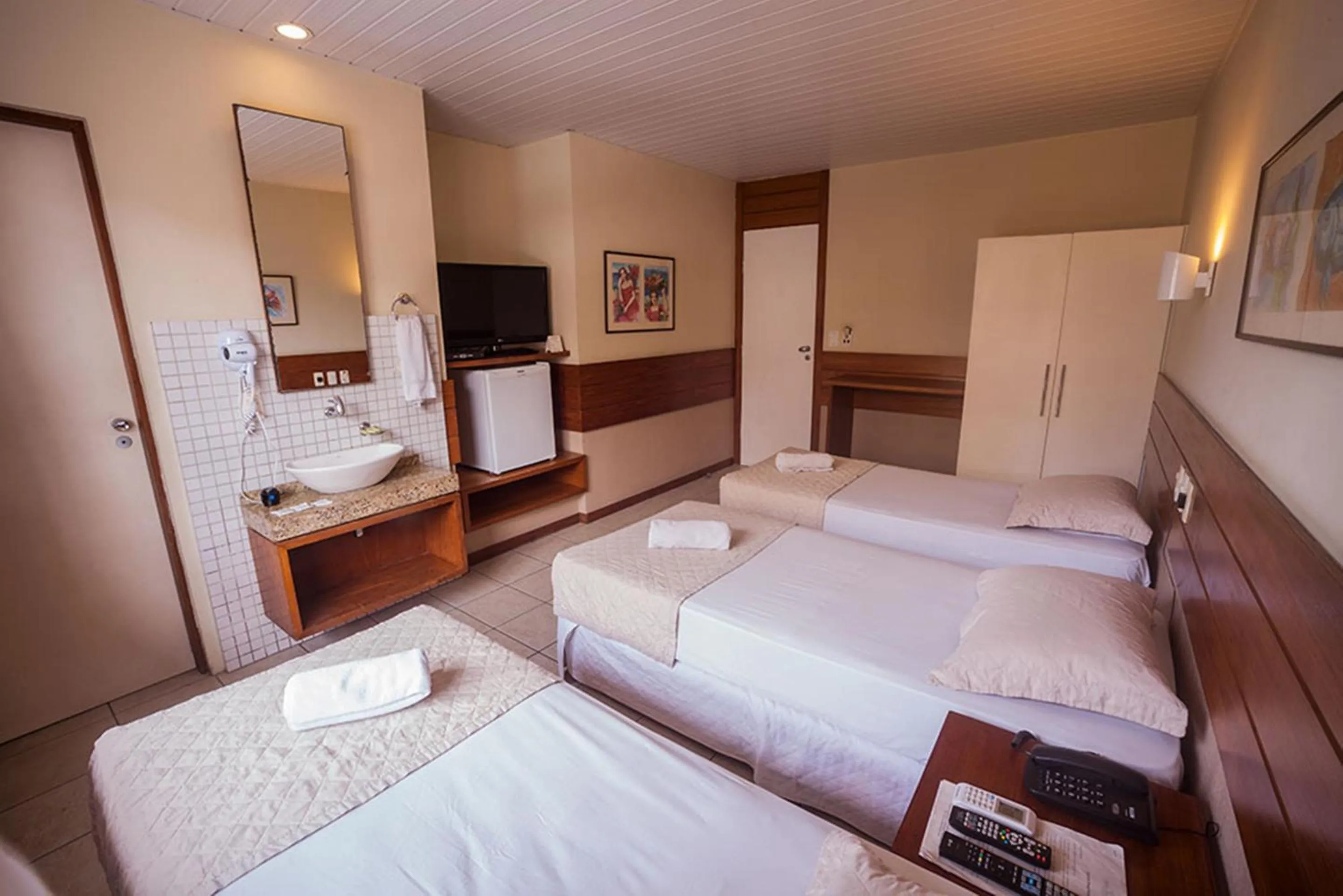 Bed in Portal Da Praia Hotel