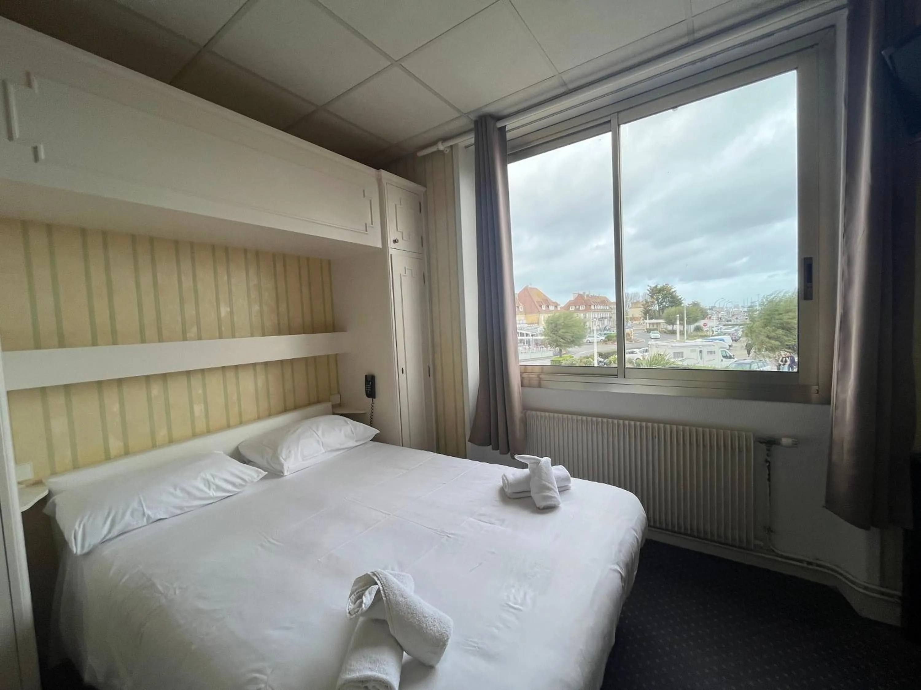 Photo of the whole room, Bed in Hôtel Le Phare