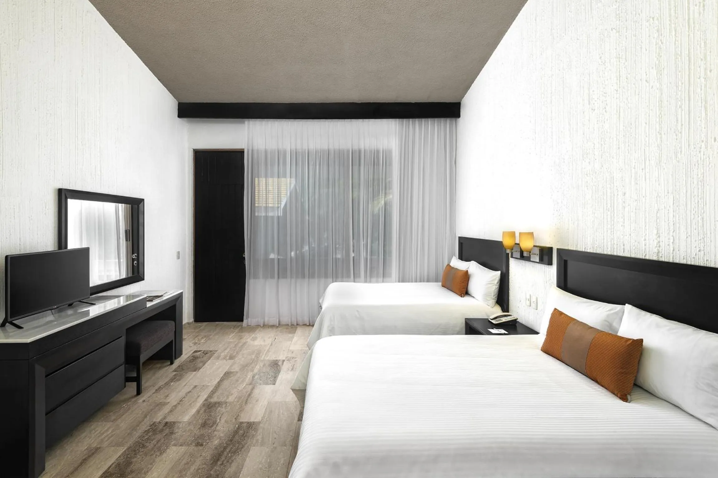 Bed in El Cid Granada Hotel & Country Club