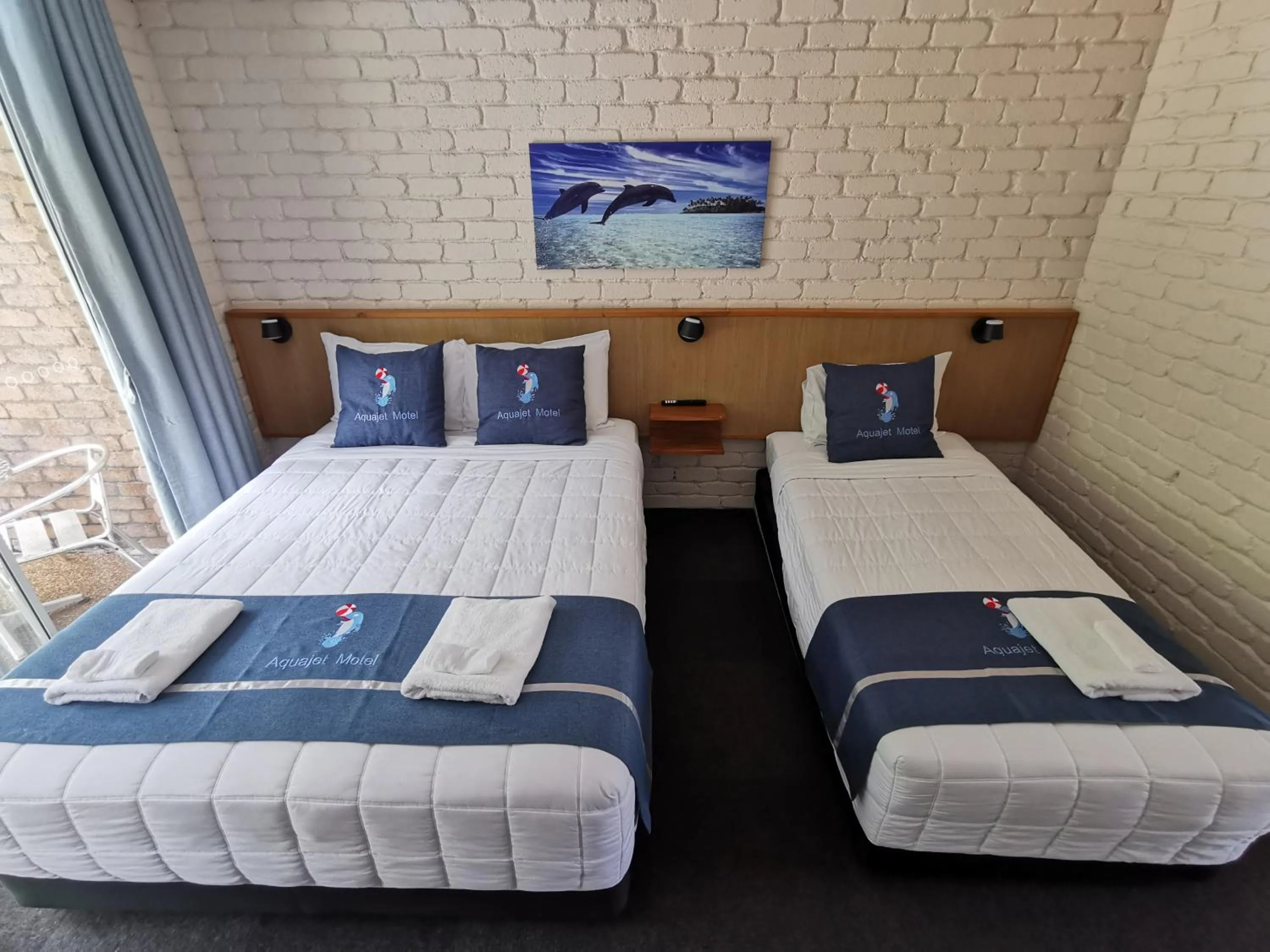 Bed in Aquajet Motel
