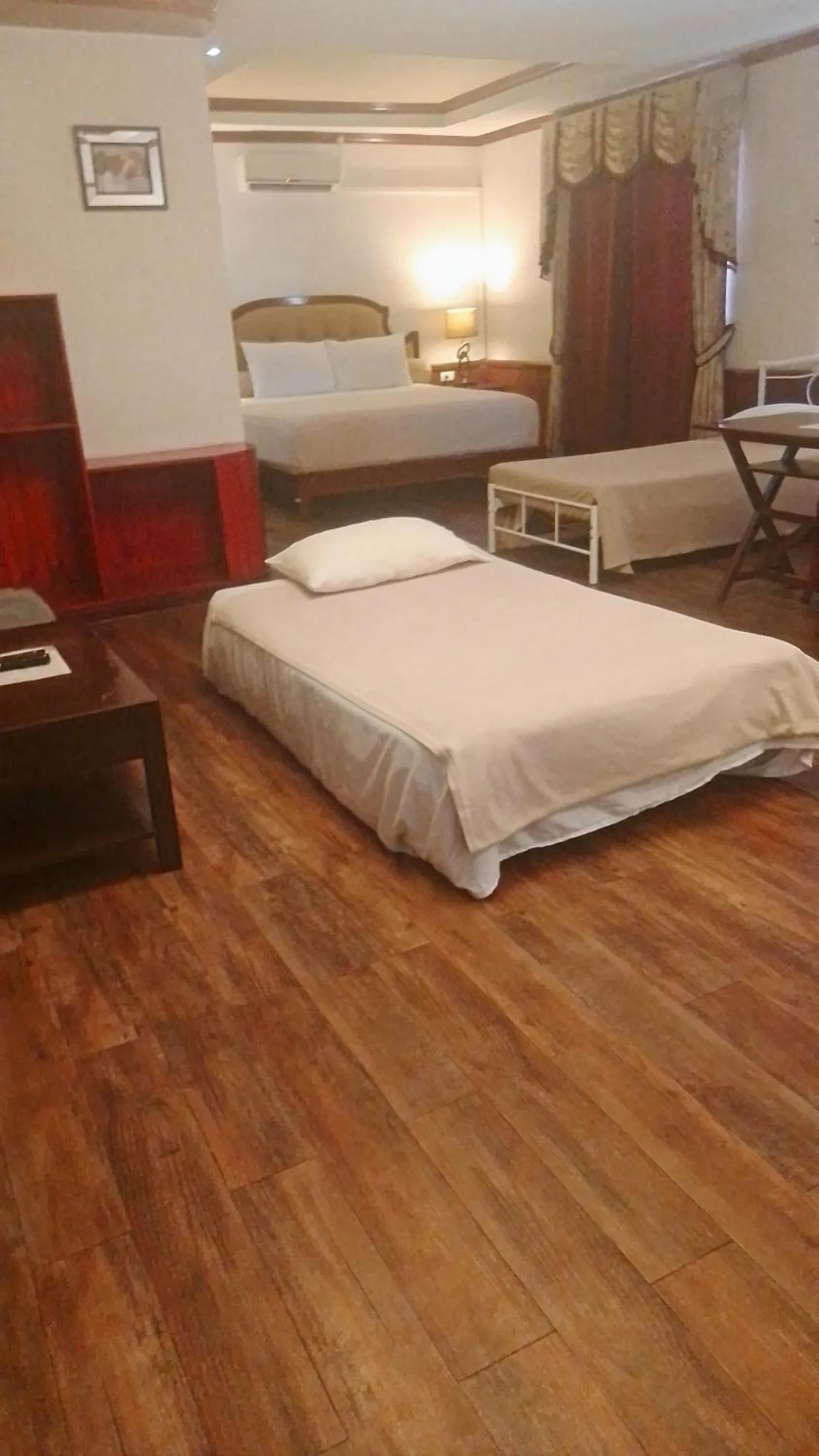 Bed in Cebu Dulcinea Hotel and Suites-MACTAN AIRPORT HOTEL