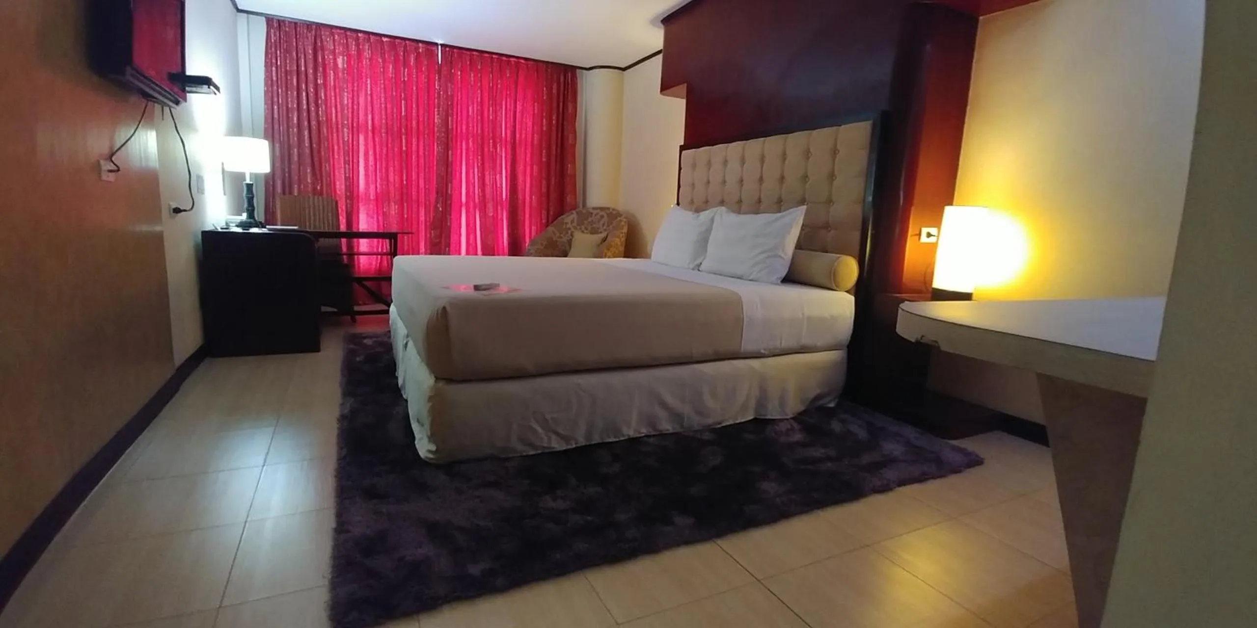 Bed in Cebu Dulcinea Hotel and Suites-MACTAN AIRPORT HOTEL