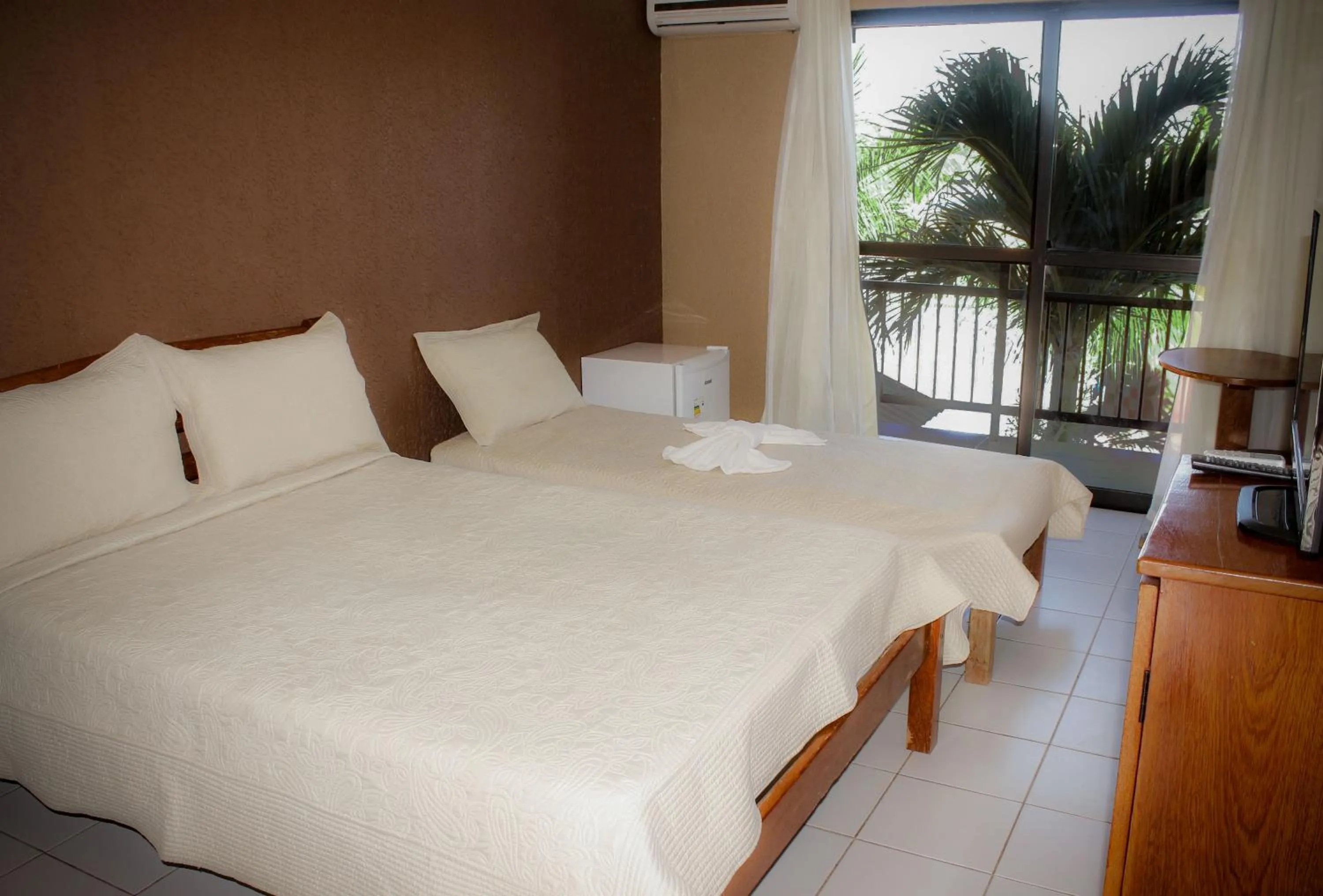 Bed in Pousada Brasil Cumbuco