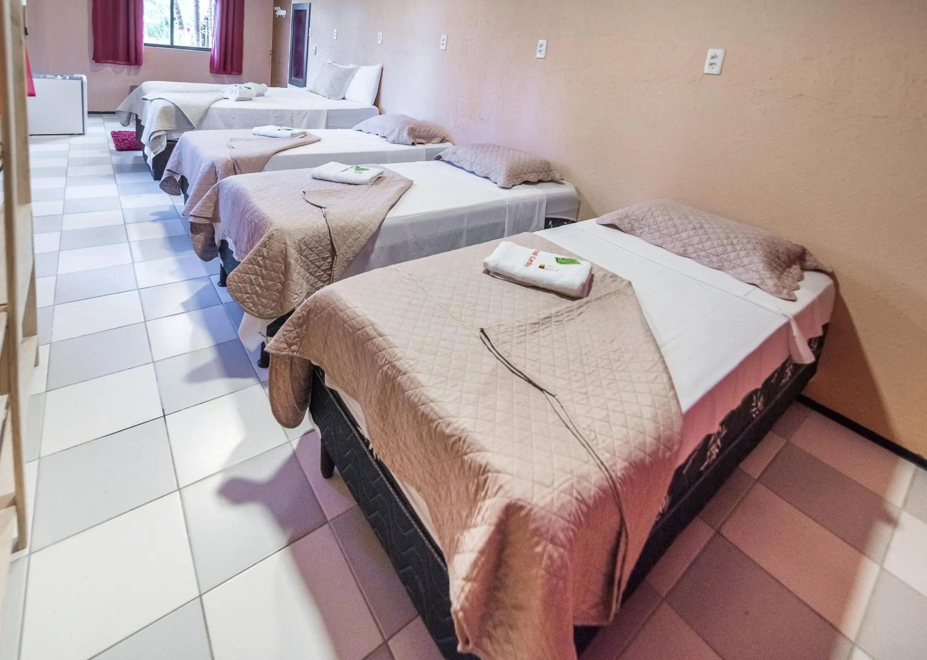 Bed in Pousada Brasil Cumbuco