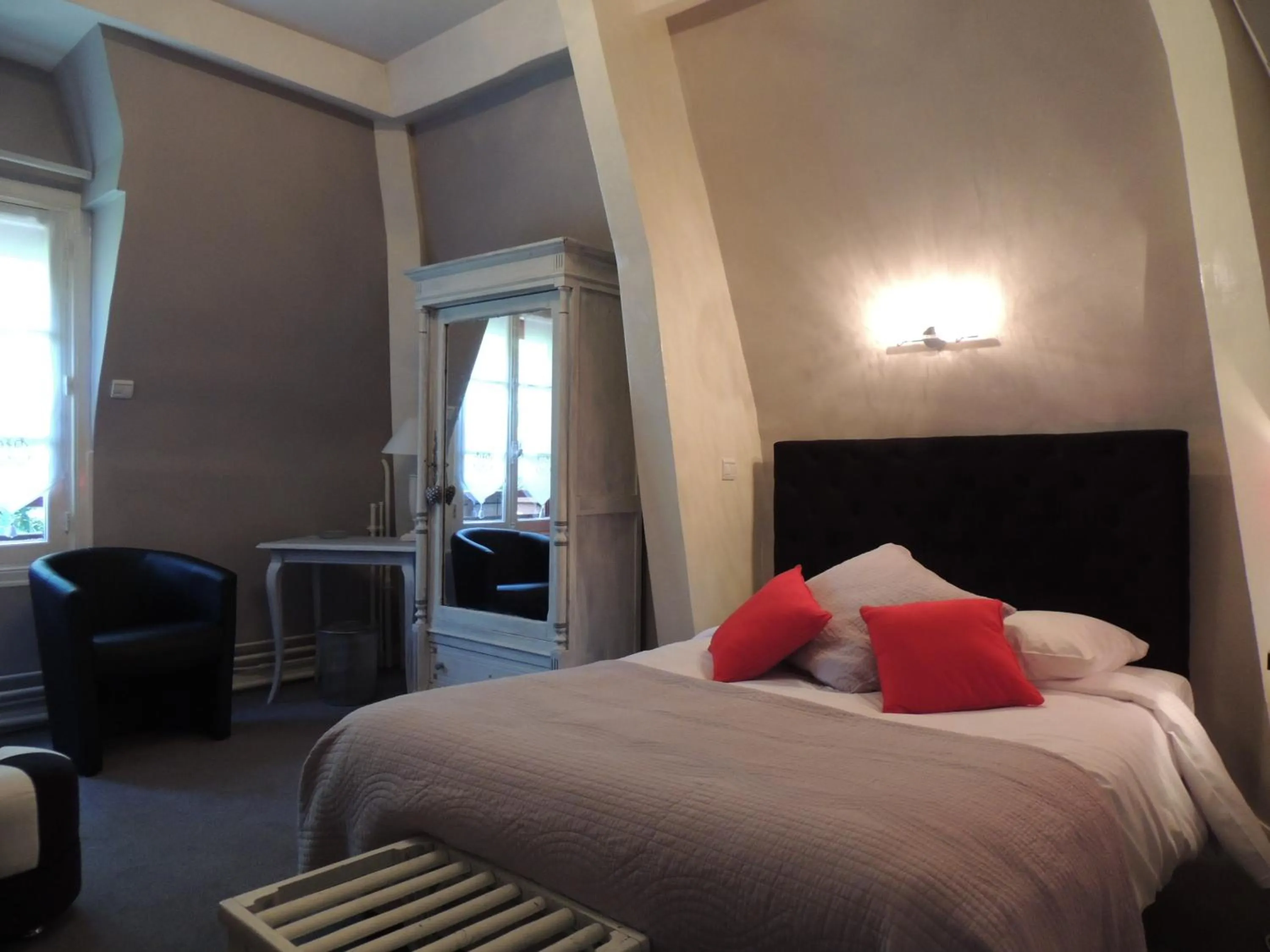 Bed in La Villa Bois Joli HOTEL RESTAURANT